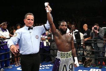 WASHINGTON, DC - APRIL 01: Adrien Broner celebrates after defeating Ashley Theophane (not pictured) by TKO in ninth round in their super lightweight championship bout at the DC Armory on April 1, 2016 in Washington, DC. (Photo by Patrick Smith/Getty Image