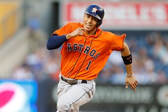 NEW YORK, NY - AUGUST 25:  (NEW YORK DAILIES OUT)    Carlos Correa #1 of the Houston Astros in action against the New York Yankees at Yankee Stadium on August 25, 2015 in the Bronx borough of New York City. The Astros defeated the Yankees 15-1.  (Photo by