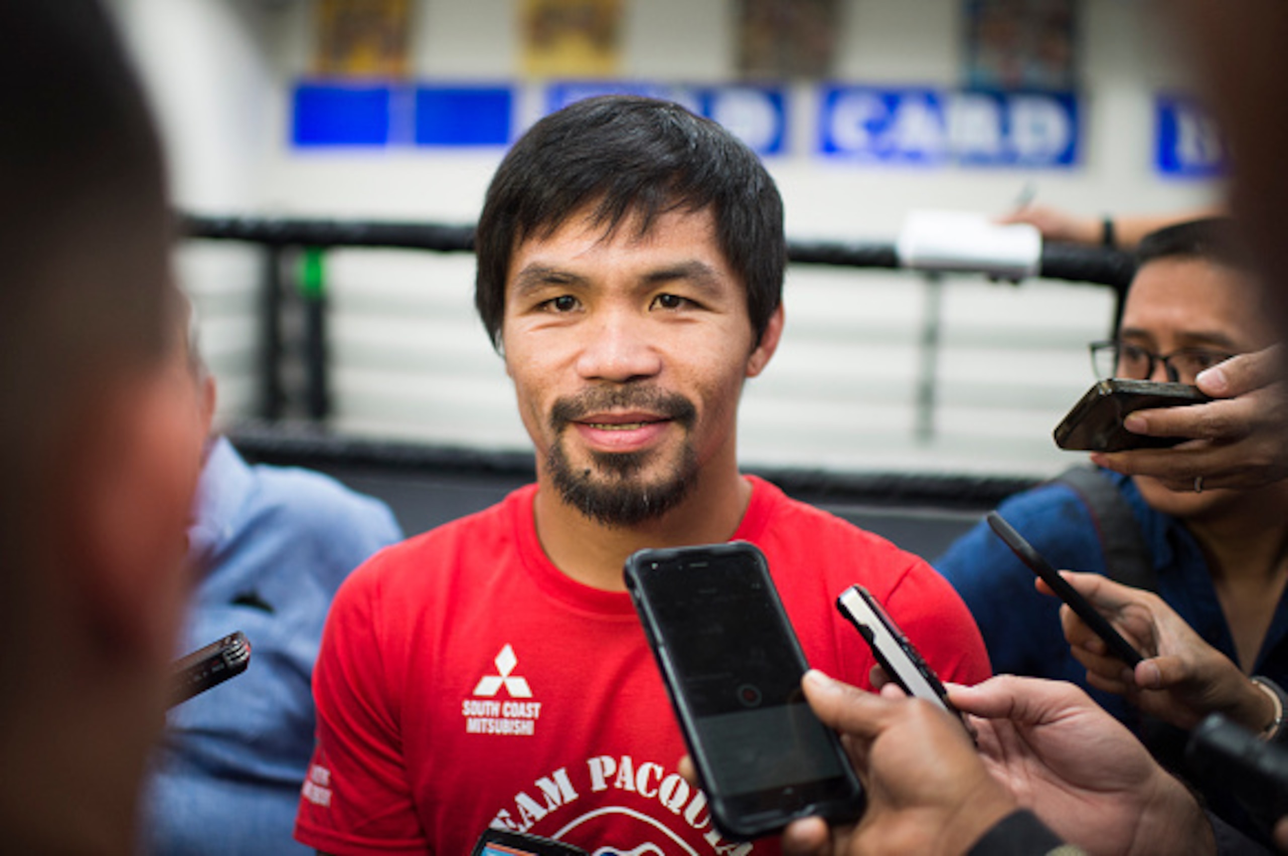 Filipino boxer Manny Pacquiao speaks with the media before his workout at the Wild Card Boxing Club in Hollywood, California, March 30, 2016. 
Pacquiao is in final preparation for his 12-round welterweight championship fight against Timothy Bradley, Jr. o
