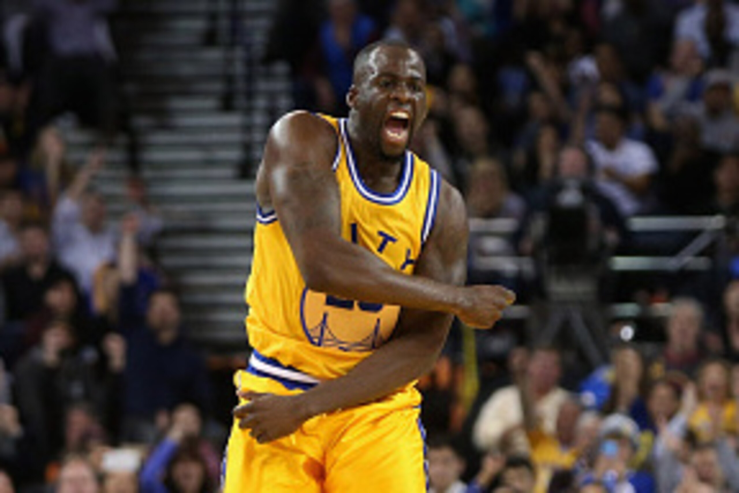 OAKLAND, CA - MARCH 29:  Draymond Green #23 of the Golden State Warriors reacts after making a shot during their game against the Washington Wizards at ORACLE Arena on March 29, 2016 in Oakland, California. NOTE TO USER: User expressly acknowledges and ag