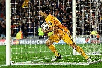 BARCELONA, SPAIN - APRIL 05:  Luis Suarez of Barcelona celebrates as he scores their first and equalising goal during the UEFA Champions League quarter final first leg match between FC Barcelona and Club Atletico de Madrid at Camp Nou on April 5, 2016 in 