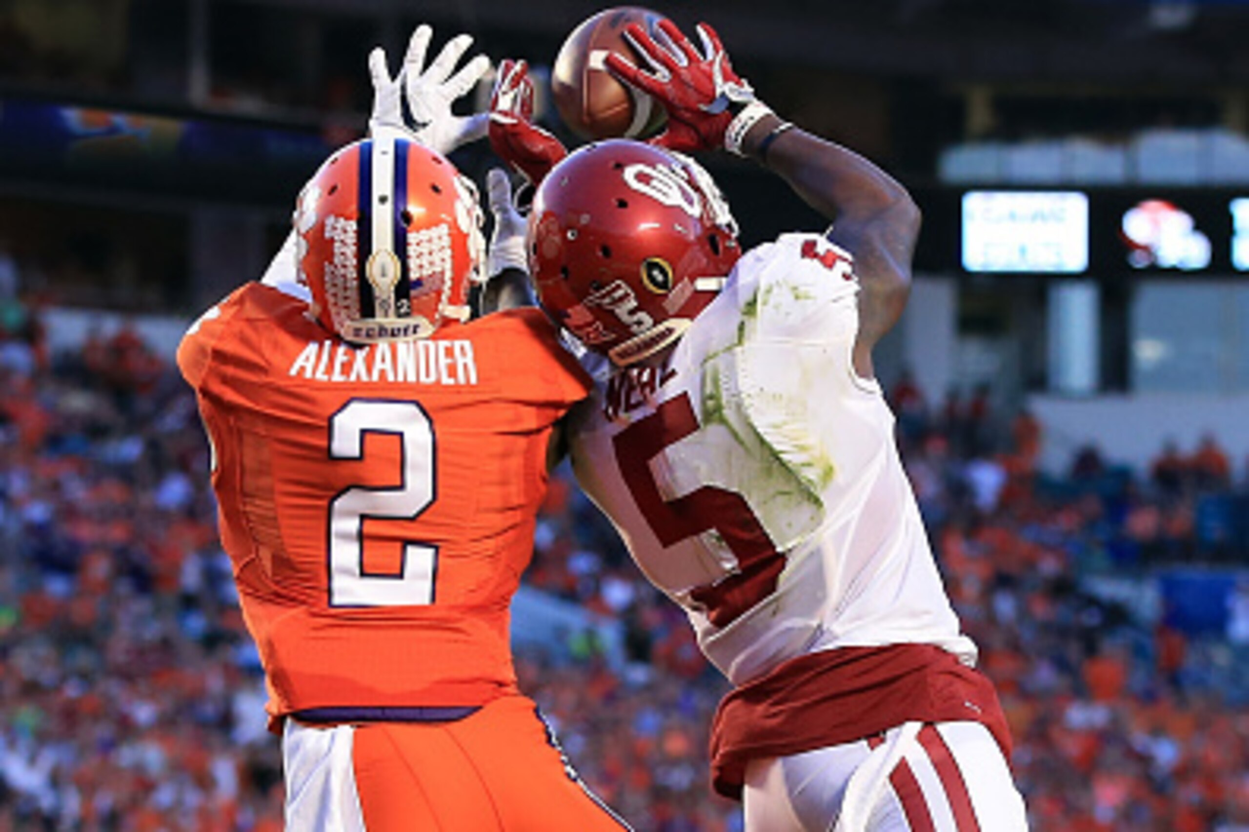 MIAMI GARDENS, FL - DECEMBER 31: Durron Neal #5 of the Oklahoma Sooners attempts to catch the ball as Mackensie Alexander #2 of the Clemson Tigers defends in the first half of the 2015 Capital One Orange Bowl at Sun Life Stadium on December 31, 2015 in M MIAMI GARDENS, FL - DECEMBER 31: Durron Neal #5 of the Oklahoma Sooners attempts to catch the ball as Mackensie Alexander #2 of the Clemson Tigers defends in the first half of the 2015 Capital One Orange Bowl at Sun Life Stadium on December 31, 2015 in M