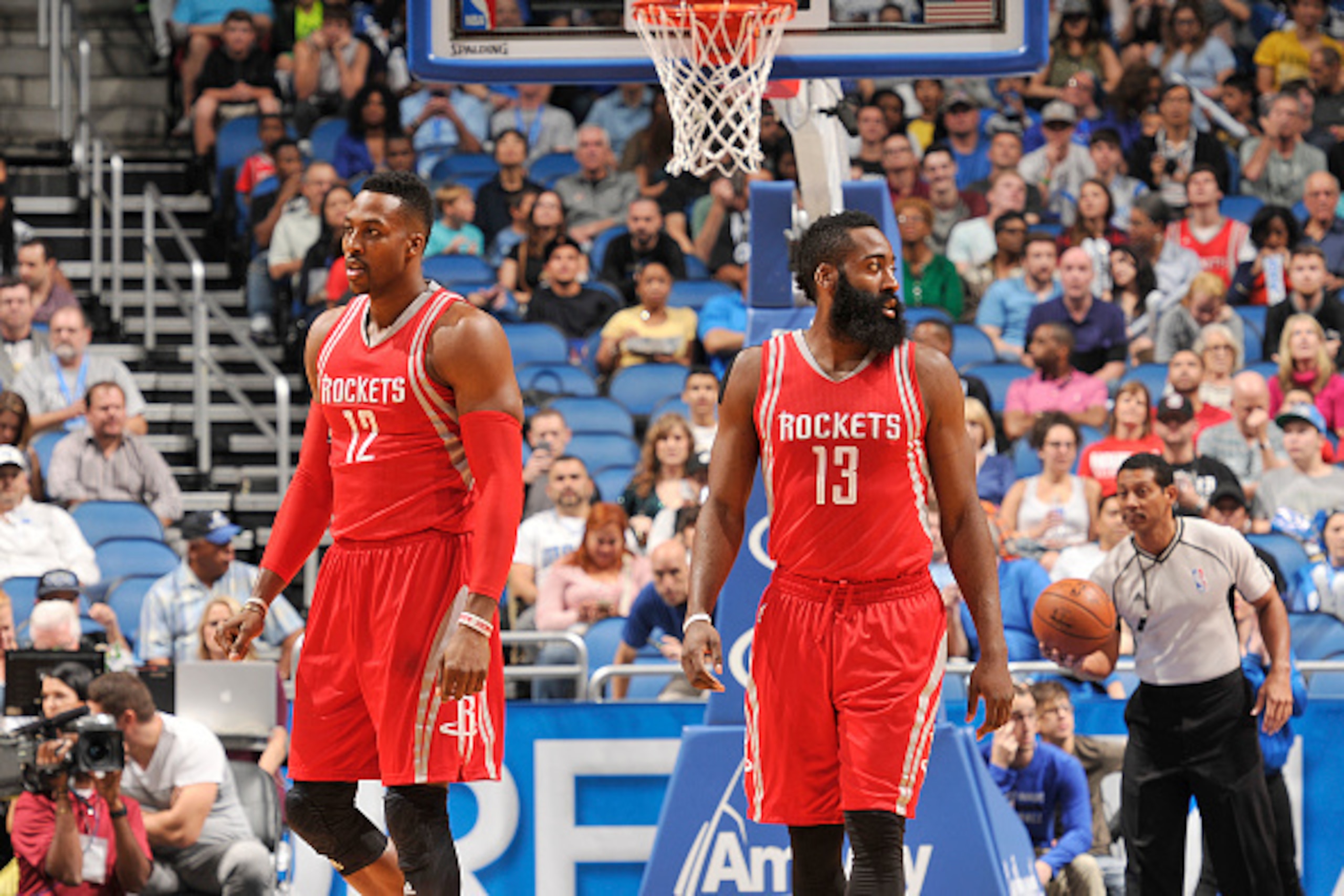 ORLANDO, FL - DECEMBER 23:  Dwight Howard #12 of the Houston Rockets and James Harden #13 of the Houston Rockets stand on the court against the Orlando Magic on December 23, 2015 at Amway Center in Orlando, Florida. NOTE TO USER: User expressly acknowledg