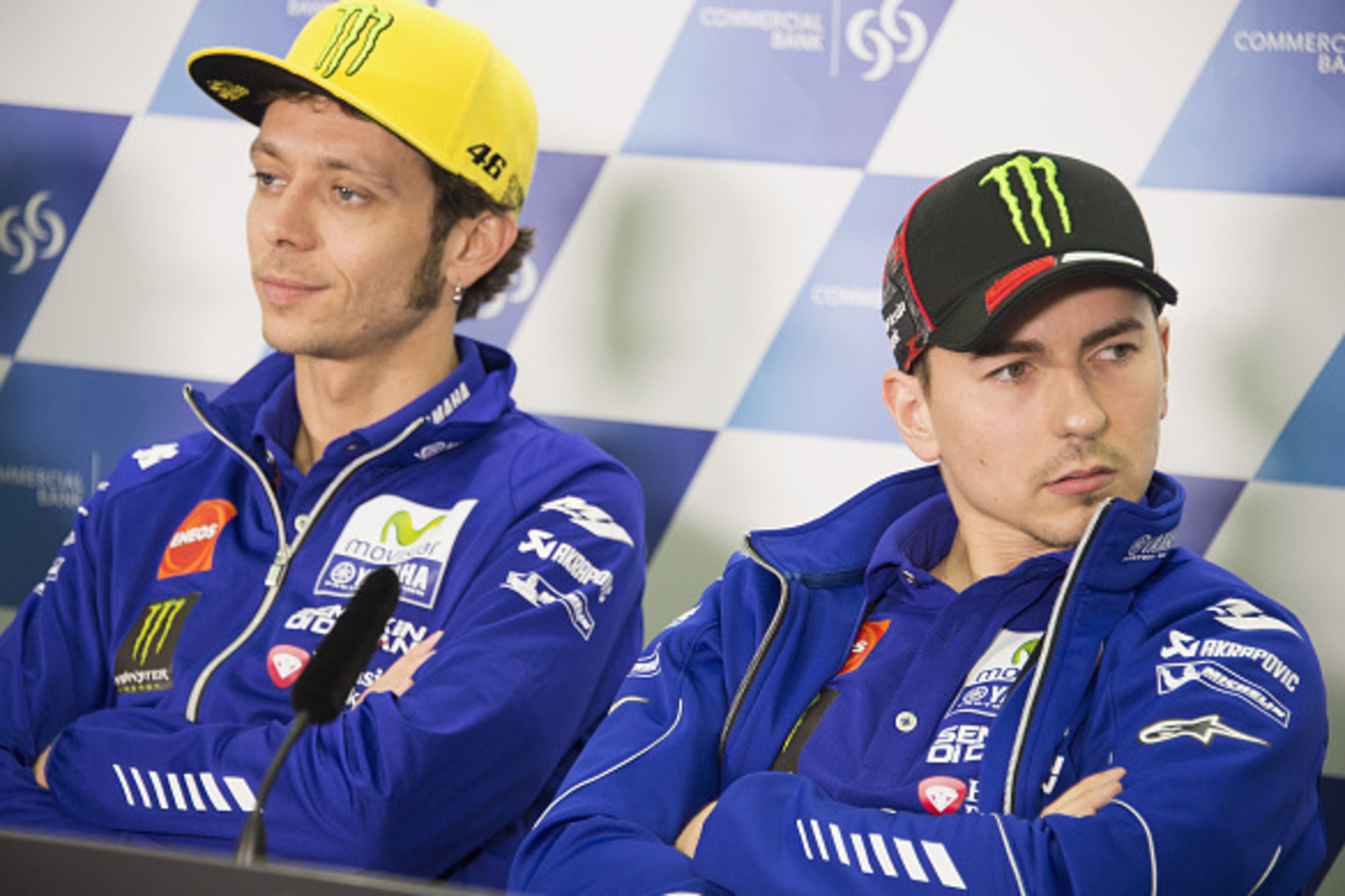 DOHA, QATAR - MARCH 16:  Jorge Lorenzo of Spain and Movistar Yamaha MotoGP and Valentino Rossi of Italy and Movistar Yamaha MotoGP (L) look on during the press conference during the MotoGp of Qatar - Press Conference at Losail Circuit on March 16, 2016 in