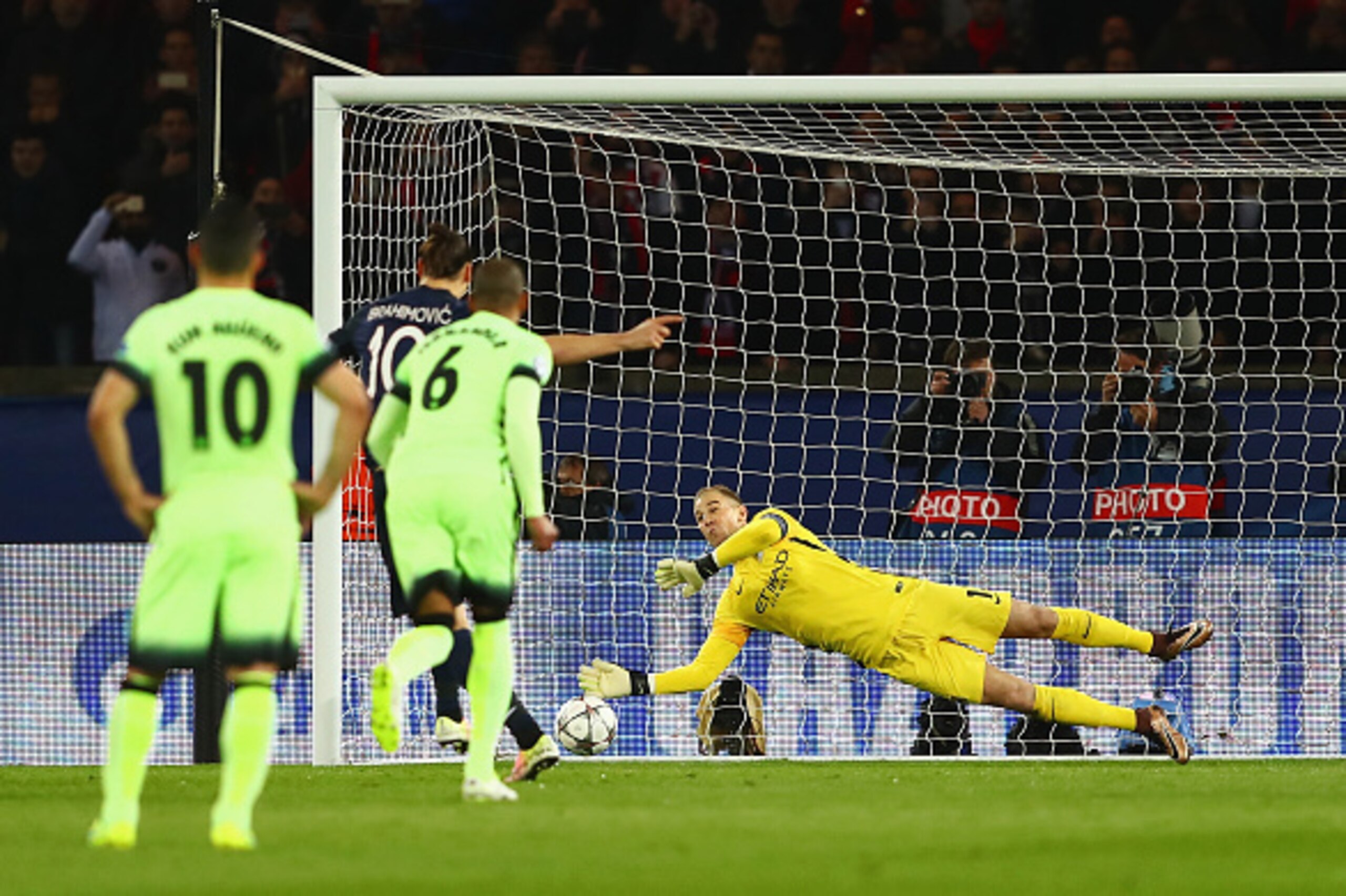 PARIS, FRANCE - APRIL 06: Joe Hart of Manchester City saves the penalty by Zlatan Ibrahimovic of Paris Saint-Germain during the UEFA Champions League Quarter Final First Leg match between Paris Saint-Germain and Manchester City at Parc des Princes on Apri