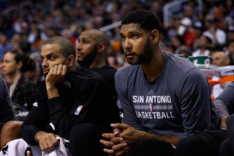 PHOENIX, AZ - FEBRUARY 21:  Tim Duncan #21 of the San Antonio Spurs on the bench during the second half of the NBA game against the Phoenix Suns at Talking Stick Resort Arena on February 21, 2016 in Phoenix, Arizona. The Spurs defeated the Suns 118-111.  