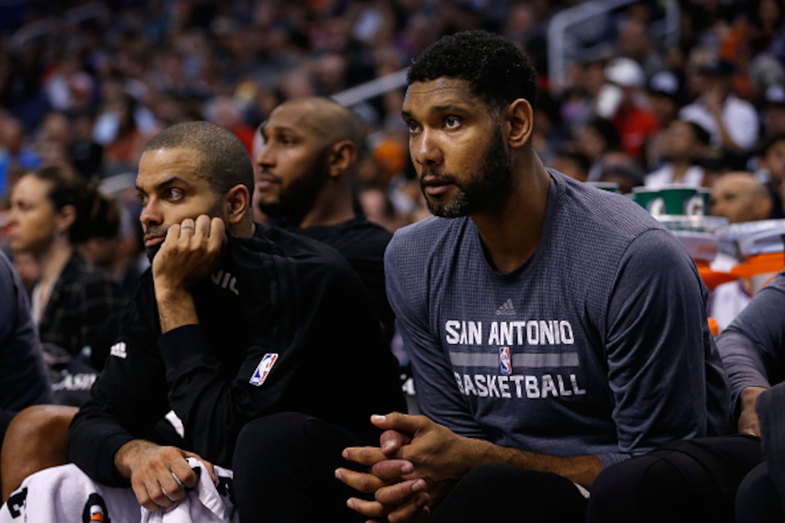PHOENIX, AZ - FEBRUARY 21:  Tim Duncan #21 of the San Antonio Spurs on the bench during the second half of the NBA game against the Phoenix Suns at Talking Stick Resort Arena on February 21, 2016 in Phoenix, Arizona. The Spurs defeated the Suns 118-111.  