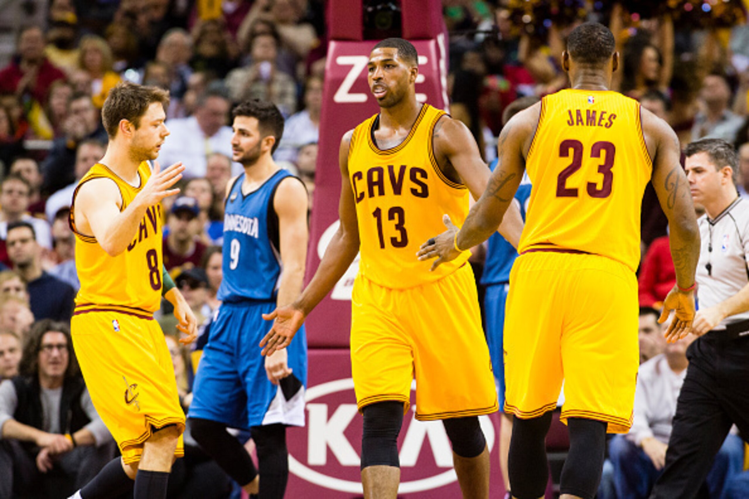 CLEVELAND, OH - JANUARY 25: Tristan Thompson #13 celebrates with Matthew Dellavedova #8 and LeBron James #23 of the Cleveland Cavaliers during the second half against the Minnesota Timberwolves at Quicken Loans Arena on January 25, 2016 in Cleveland, Ohio CLEVELAND, OH - JANUARY 25: Tristan Thompson #13 celebrates with Matthew Dellavedova #8 and LeBron James #23 of the Cleveland Cavaliers during the second half against the Minnesota Timberwolves at Quicken Loans Arena on January 25, 2016 in Cleveland, Ohio