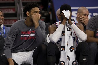PHILADELPHIA, PA - FEBRUARY 23: Jahlil Okafor #8 and Nerlens Noel #4 of the Philadelphia 76ers watch the game against the Orlando Magic from the bench on February 23, 2016 at the Wells Fargo Center in Philadelphia, Pennsylvania. The Magic defeated the 76e