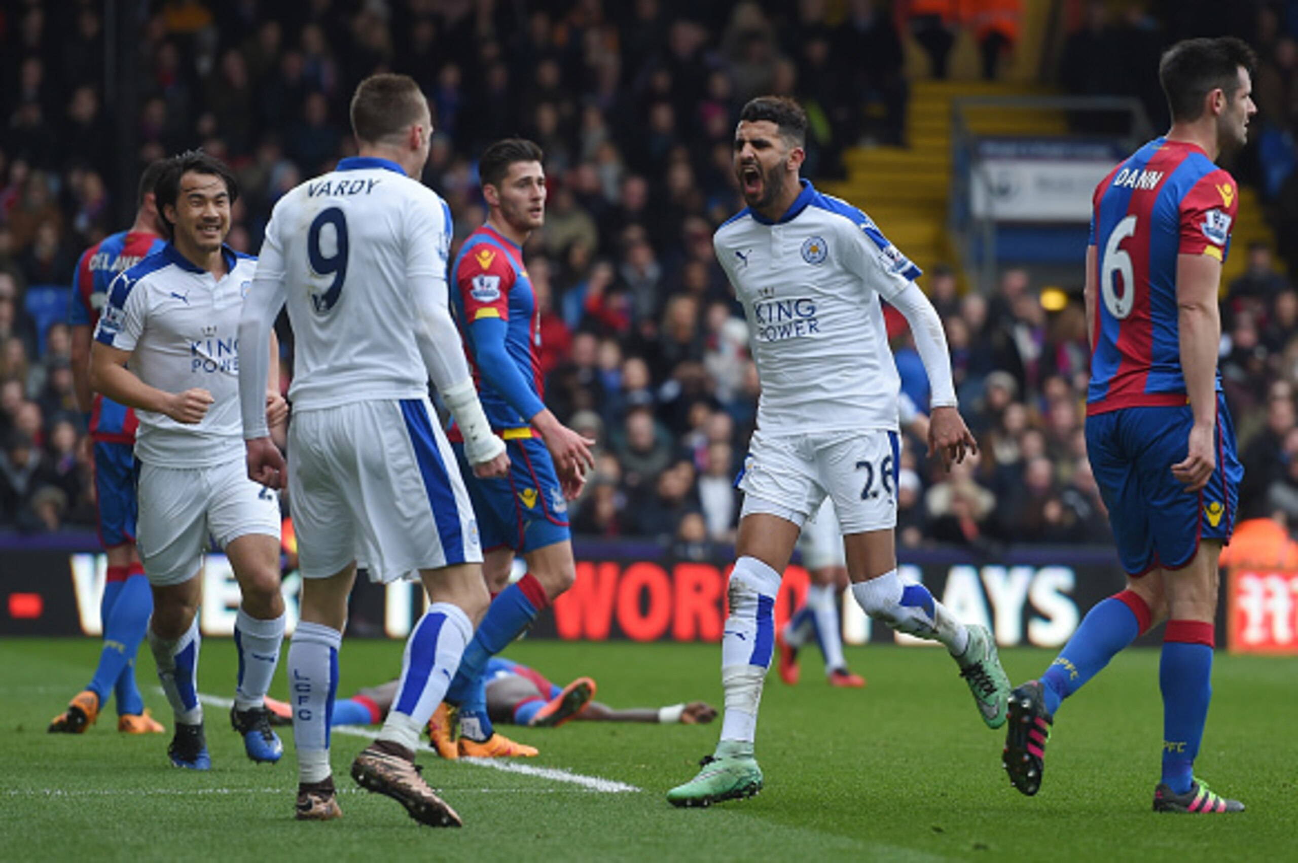LONDON, ENGLAND - MARCH 19:  Riyad Mahrez (R) of Leicester City celebrates scoring his team's first goal with his team mate Jamie Vardy (L) during the Barclays Premier League match between Crystal Palace and Leicester City at Selhurst Park on March 19, 20