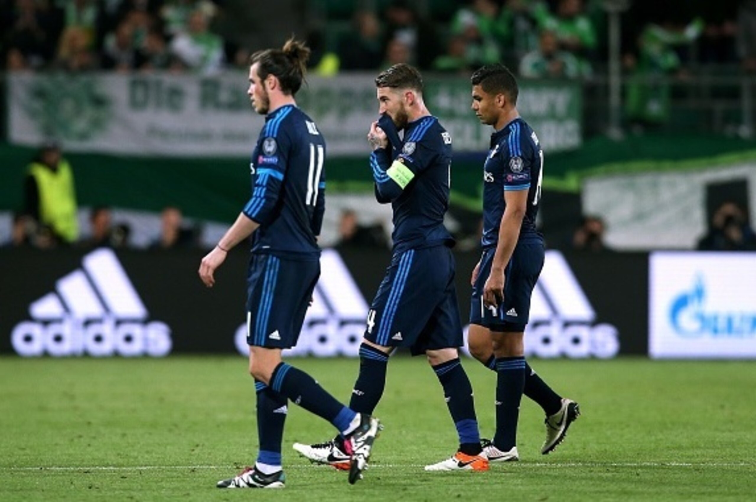 L-R) Real Madrid's Welsh forward Gareth Bale Real Madrid's defender Sergio Ramos and Real Madrid's Brazilian midfielder Casemiro react after the UEFA Champions League quarter-final, first-leg football match between VfL Wolfsburg and Real Madrid on April 6 L-R) Real Madrid's Welsh forward Gareth Bale Real Madrid's defender Sergio Ramos and Real Madrid's Brazilian midfielder Casemiro react after the UEFA Champions League quarter-final, first-leg football match between VfL Wolfsburg and Real Madrid on April 6