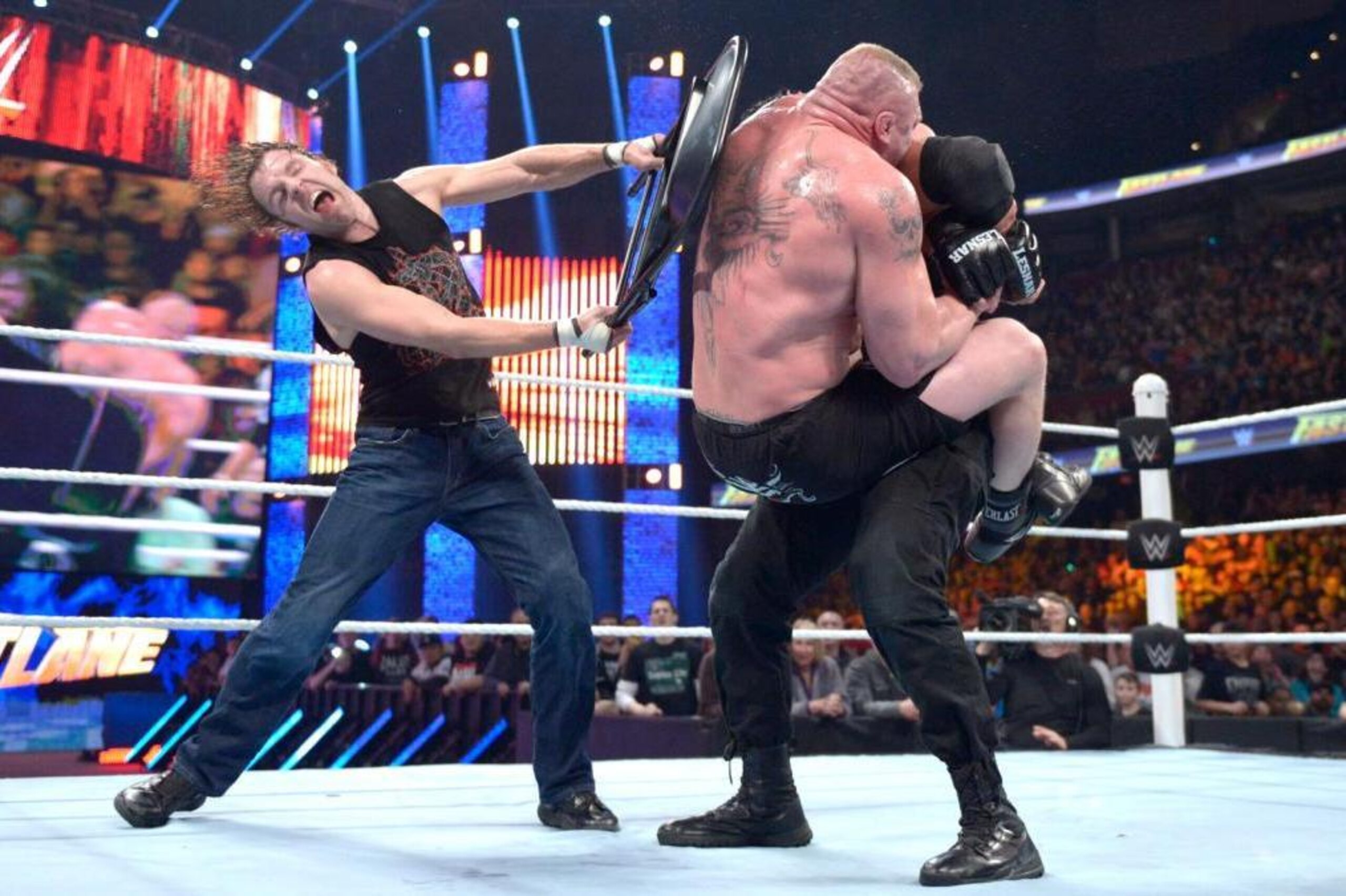 Dean Ambrose prevents Brock Lesnar from getting the victory at Fastlane.