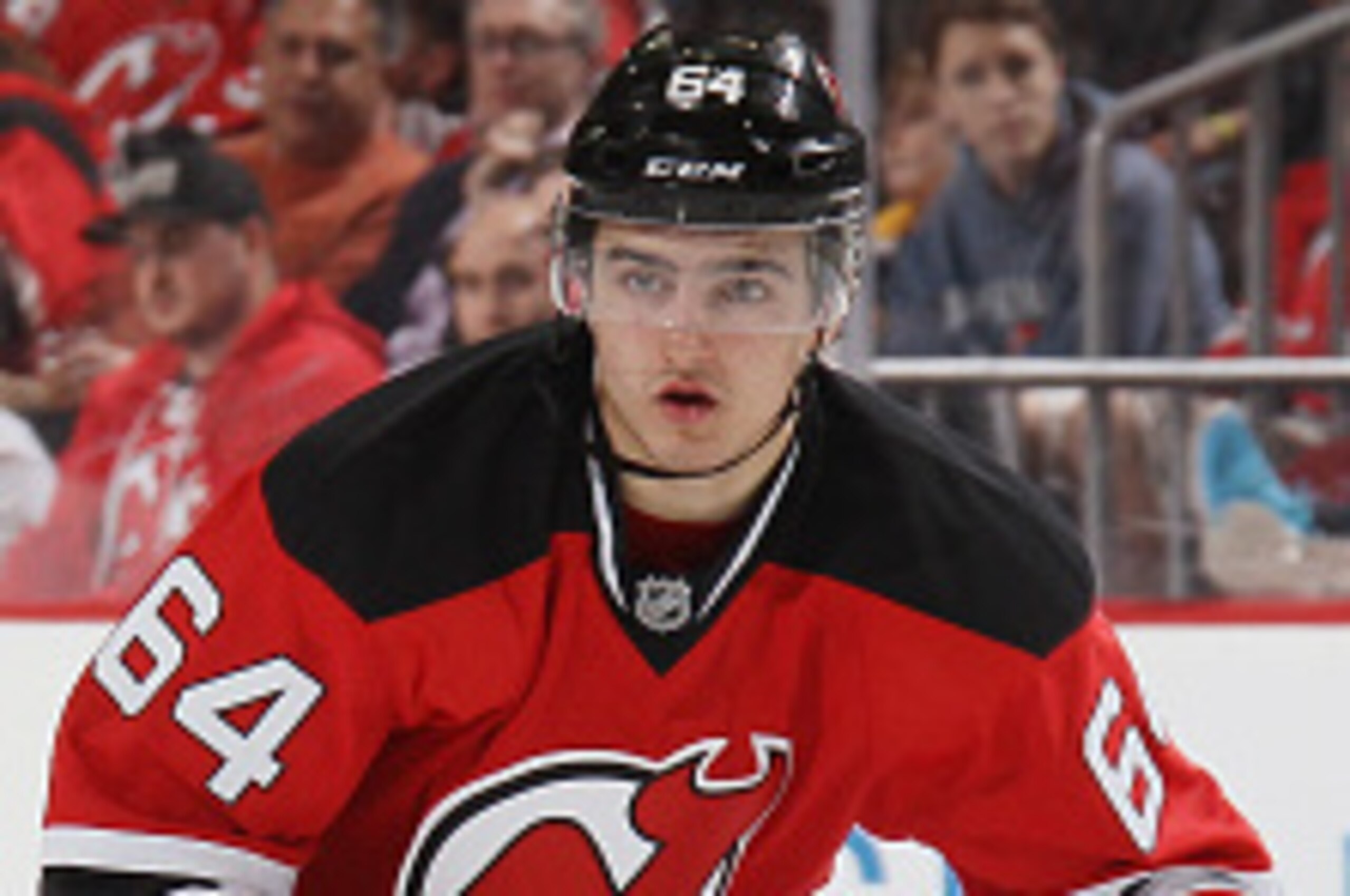 NEWARK, NJ - MARCH 29:  Joseph Blandisi #64 of the New Jersey Devils skates against the Boston Bruins at the Prudential Center on March 29, 2016 in Newark, New Jersey. The Devils defeated the Bruins 2-1.  (Photo by Bruce Bennett/Getty Images)