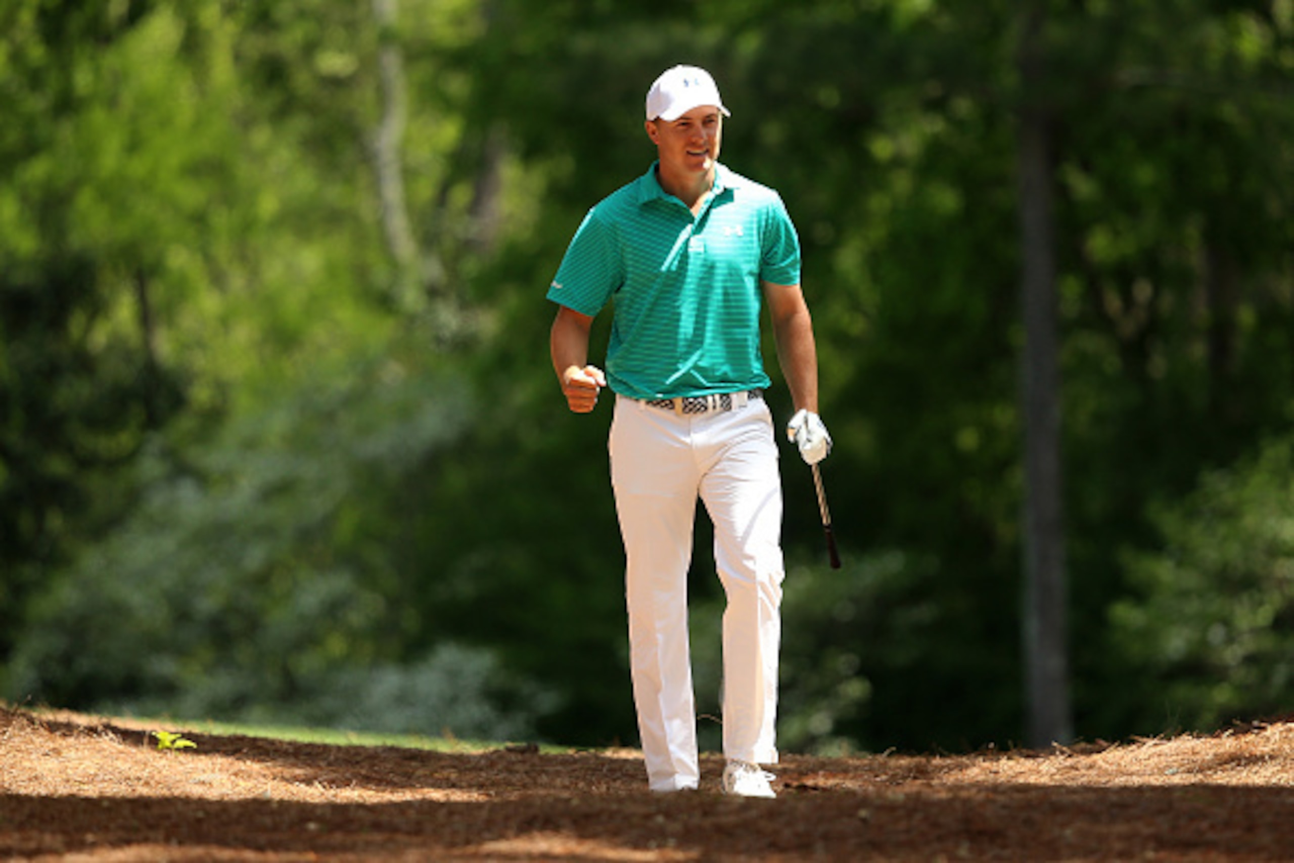 AUGUSTA, GEORGIA - APRIL 07:  Jordan Spieth of the United States reacts after playing his second shot on the 11th hole during the first round of the 2016 Masters Tournament at Augusta National Golf Club on April 7, 2016 in Augusta, Georgia.  (Photo by And