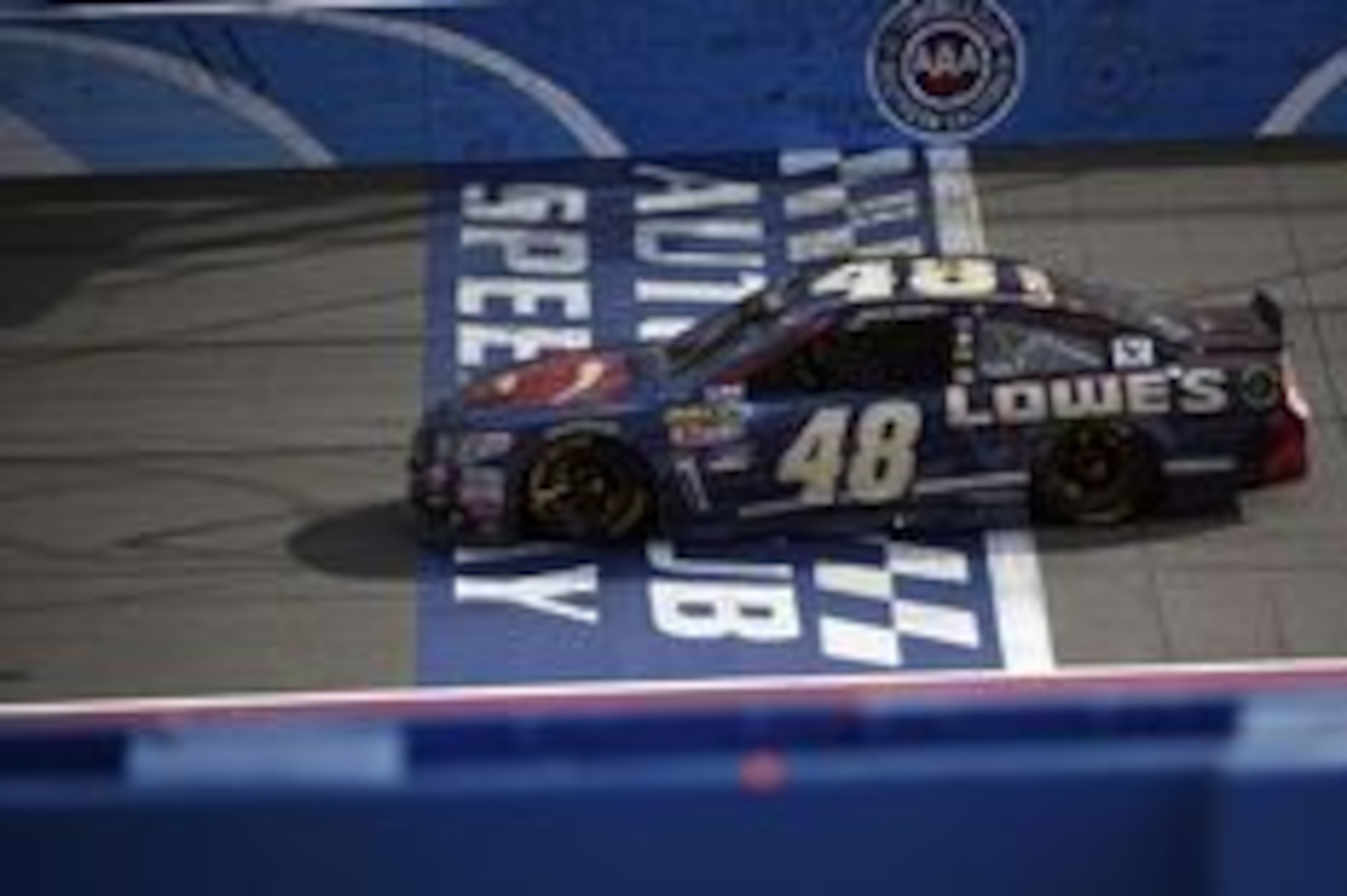 Mar 20, 2016; Fontana, CA, USA; Sprint Cup Series driver Jimmie Johnson (48) crosses the finish line to win the Auto Club 400 at Auto Club Speedway. Mandatory Credit: Kelvin Kuo-USA TODAY Sports Mar 20, 2016; Fontana, CA, USA; Sprint Cup Series driver Jimmie Johnson (48) crosses the finish line to win the Auto Club 400 at Auto Club Speedway. Mandatory Credit: Kelvin Kuo-USA TODAY Sports