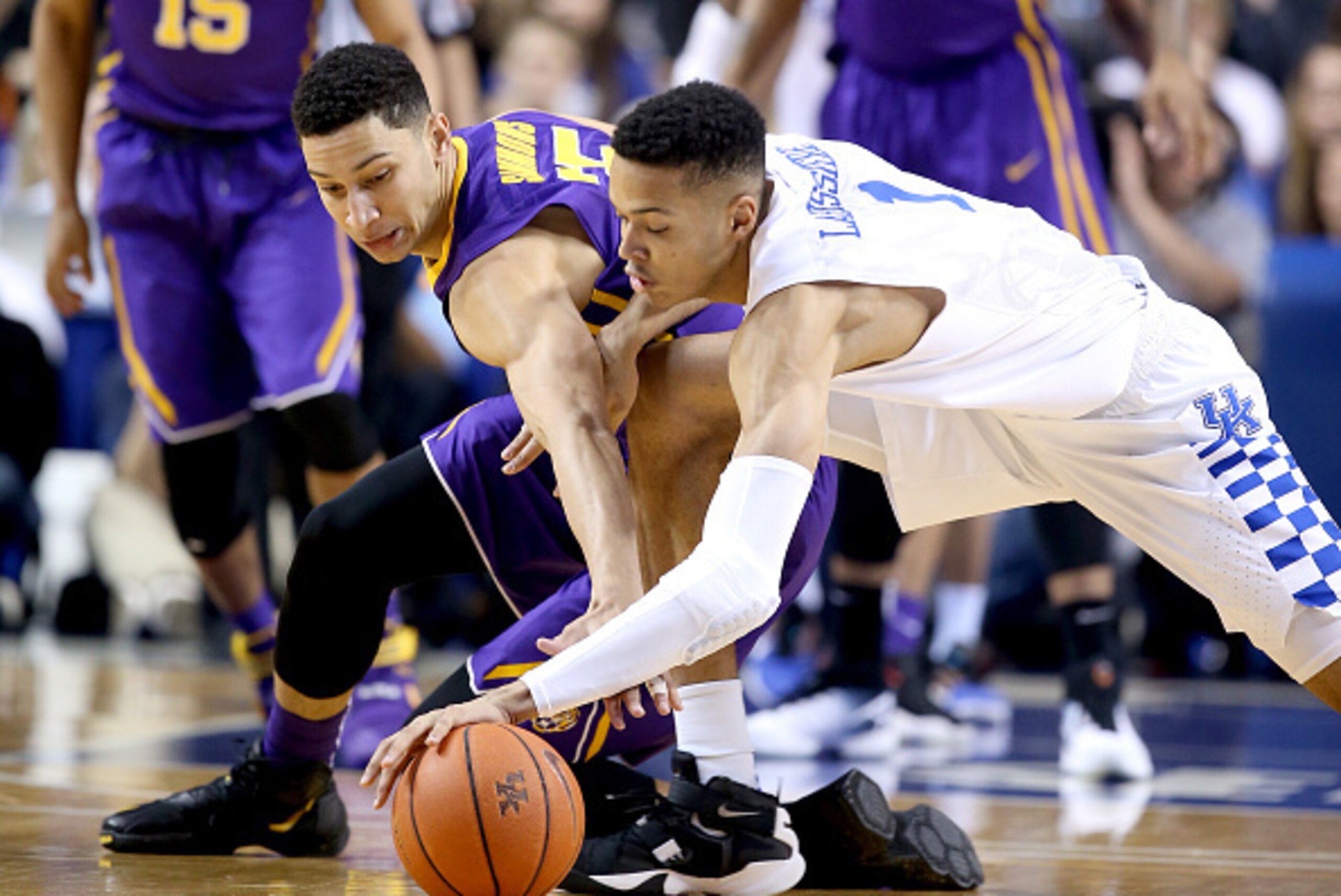 LEXINGTON, KY - MARCH 05:  Ben Simmons #25 of the LSU Tigers and Skal Labissiere #1 of the Kentucky Wildcats reach for a loose ball during the game at Rupp Arena on March 5, 2016 in Lexington, Kentucky.  (Photo by Andy Lyons/Getty Images)