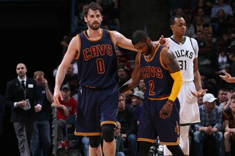 MILWAUKEE, WI - APRIL 5:  Kevin Love #0 of the Cleveland Cavaliers and Kyrie Irving #2 of the Cleveland Cavaliers during the game against the Milwaukee Bucks on April 5, 2016 at the BMO Harris Bradley Center in Milwaukee, Wisconsin. NOTE TO USER: User exp