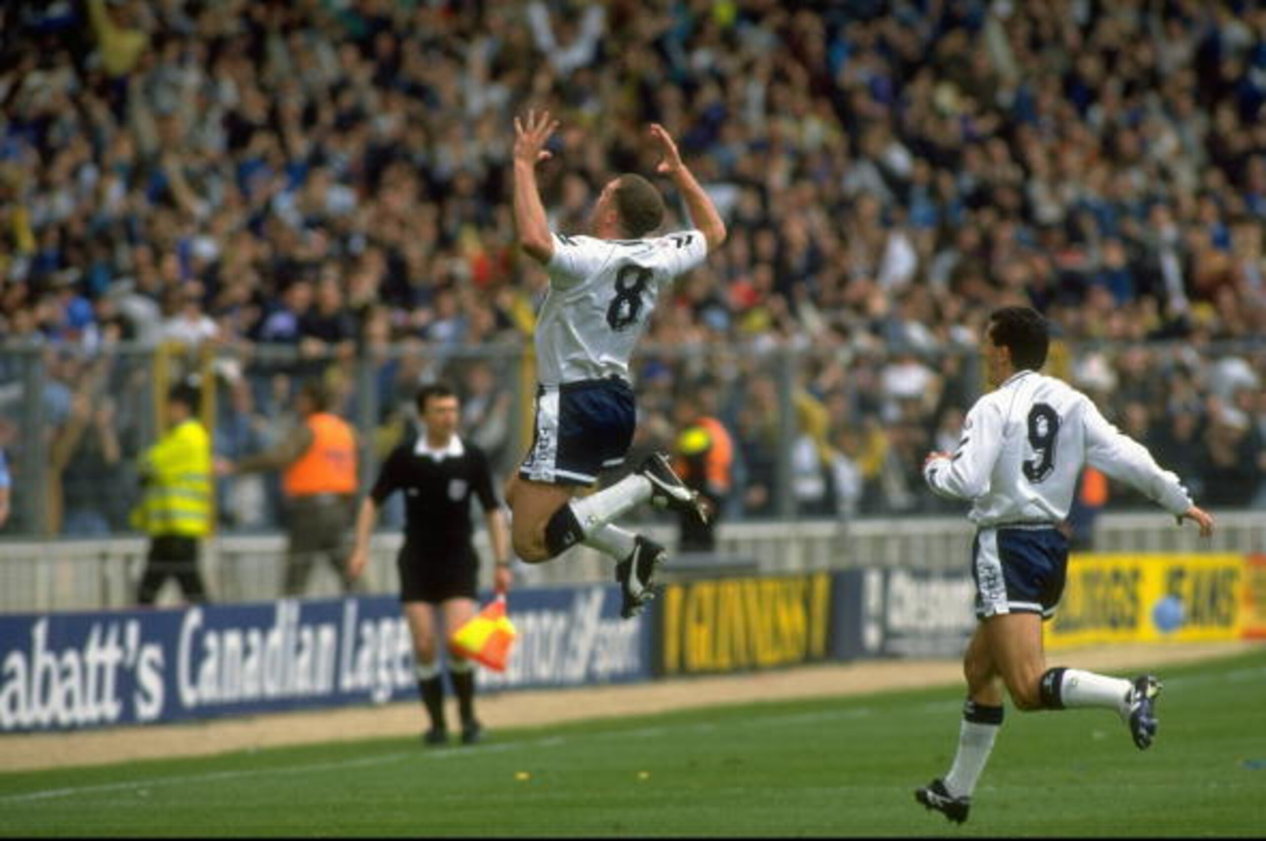 1991:  Paul Gascoigne #8 of Tottenham Hotspur celebrates his 35 yard goal during the FA Cup Semi-Final against Arsenal at Wembley Stadium in London. Tottenham Hotspur won the match 3-1. \ Mandatory Credit: Simon  Bruty/Allsport