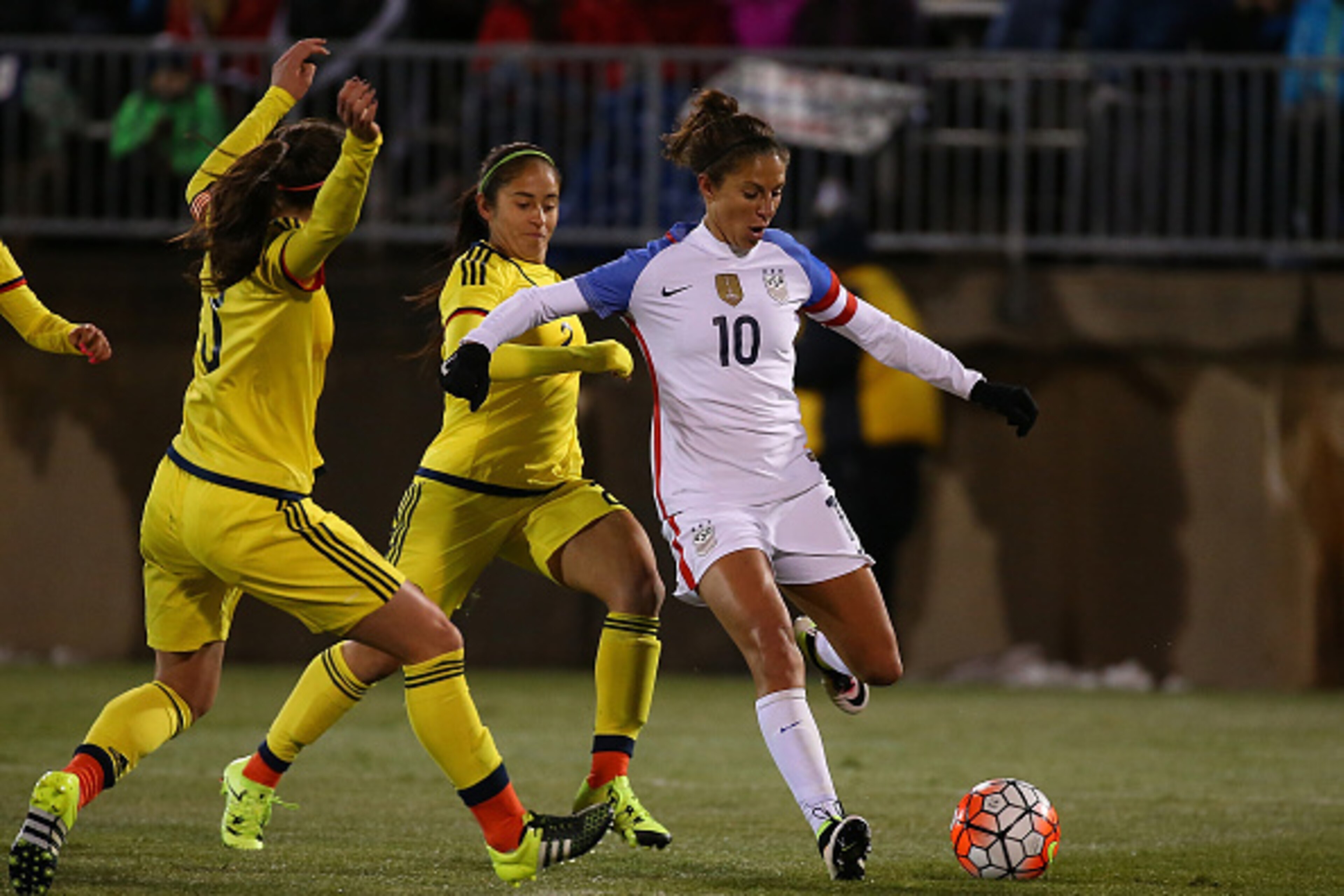 EAST HARTFORD, CT- APRIL 6: Carli Lloyd #10 of the United States works toward the net as Colombia players defend in the second half during an international friendly soccer match at the Pratt & Whitney Stadium on April 6, 2016 in East Hartford, Connecticut