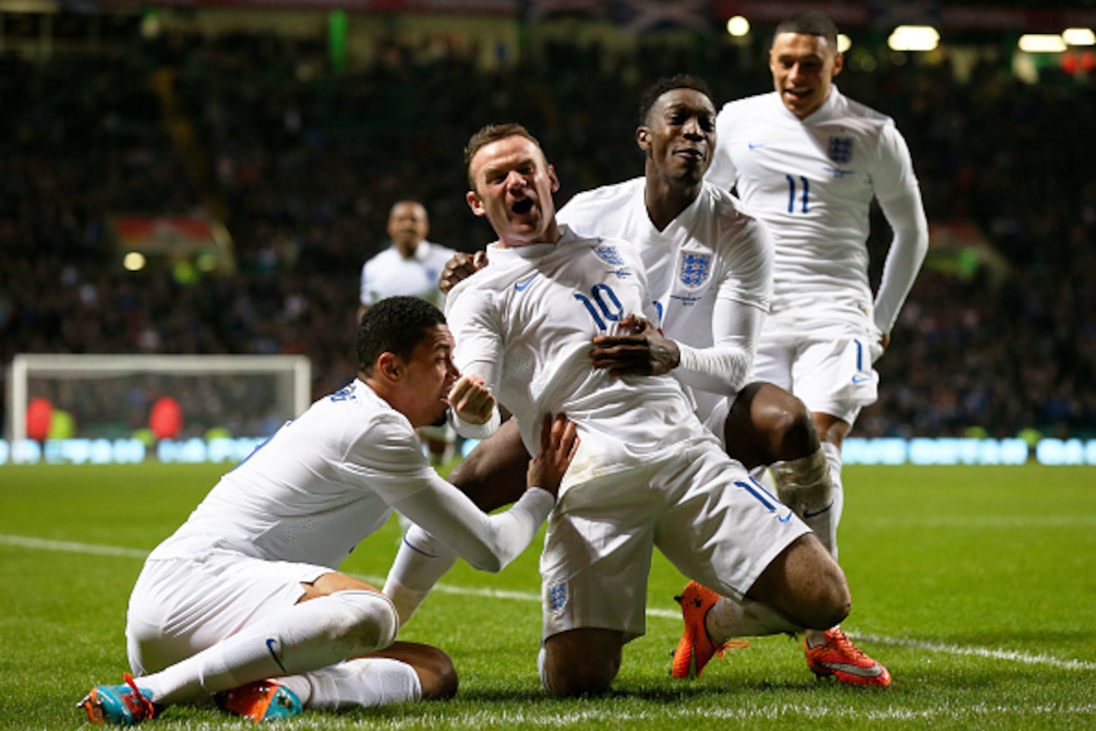 GLASGOW, SCOTLAND - NOVEMBER 18:  Wayne Rooney of England celebrates after scoring his team's  second goal during the International Friendly match between Scotland and England at Celtic Park Stadium on November 18, 2014 in Glasgow, Scotland.  (Photo by Al