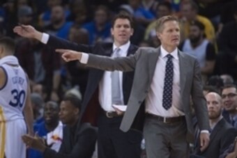 January 25, 2016; Oakland, CA, USA; Golden State Warriors head coach Steve Kerr (right) and assistant coach Luke Walton (left) during the fourth quarter against the San Antonio Spurs at Oracle Arena. The Warriors defeated the Spurs 120-90. Mandatory Credi