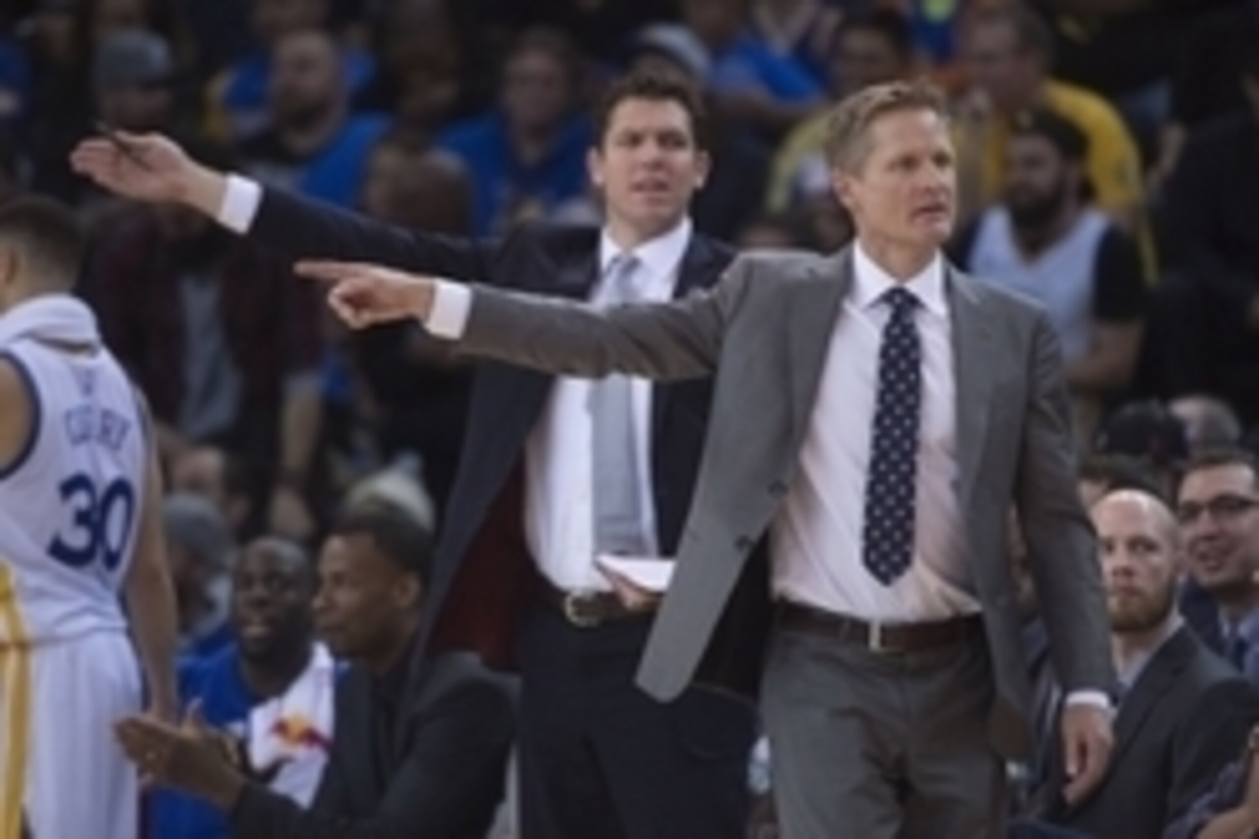 January 25, 2016; Oakland, CA, USA; Golden State Warriors head coach Steve Kerr (right) and assistant coach Luke Walton (left) during the fourth quarter against the San Antonio Spurs at Oracle Arena. The Warriors defeated the Spurs 120-90. Mandatory Credi