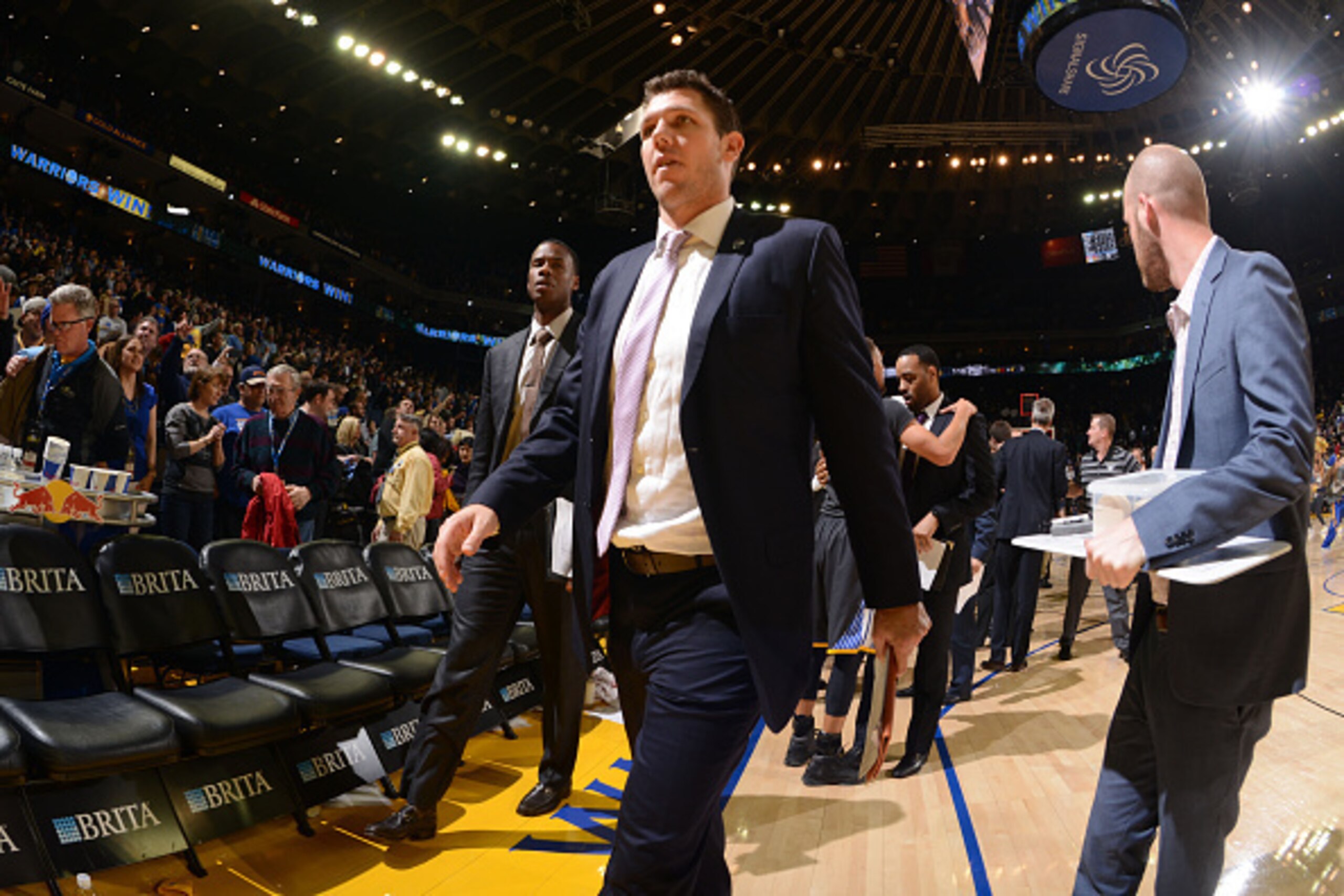 OAKLAND, CA - MARCH 12: Assistant coach Luke Walton of the Golden State Warriors heads off the court after defeating the Phoenix Suns on March 12, 2016 at Oracle Arena in Oakland, California. NOTE TO USER: User expressly acknowledges and agrees that, by d