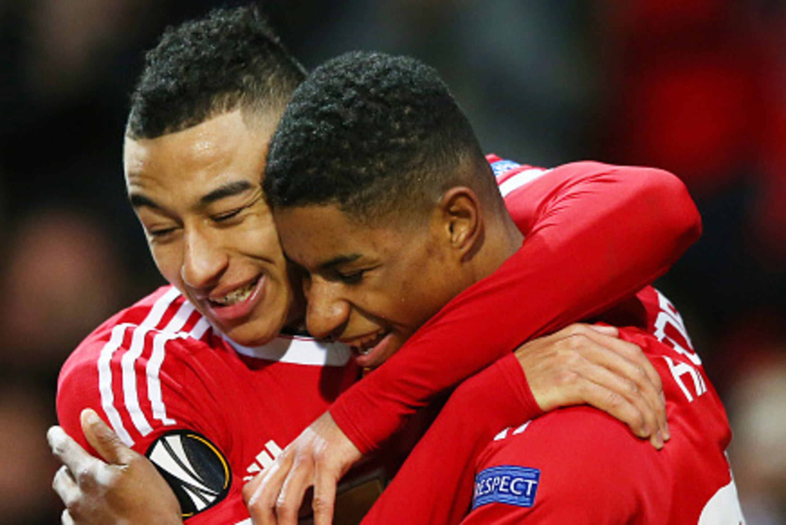 MANCHESTER, ENGLAND - FEBRUARY 25:  Marcus Rashford (R) of Manchester United celebrates scoring his team's second goal with his team mate Jesse Lingard (L) during the UEFA Europa League Round of 32 second leg match between Manchester United and FC Midtjyl