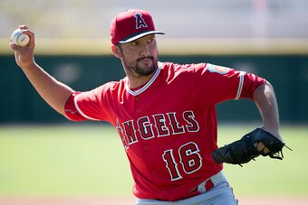 TEMPE, AZ - February 28: Huston Street #16 of the Los Angeles Angels of Anaheim throws a ball during spring training on February 28, 2016 at Tempe Diablo Stadium in Tempe, Arizona. (Photo by Matt Brown/Angels Baseball LP/Getty Images)