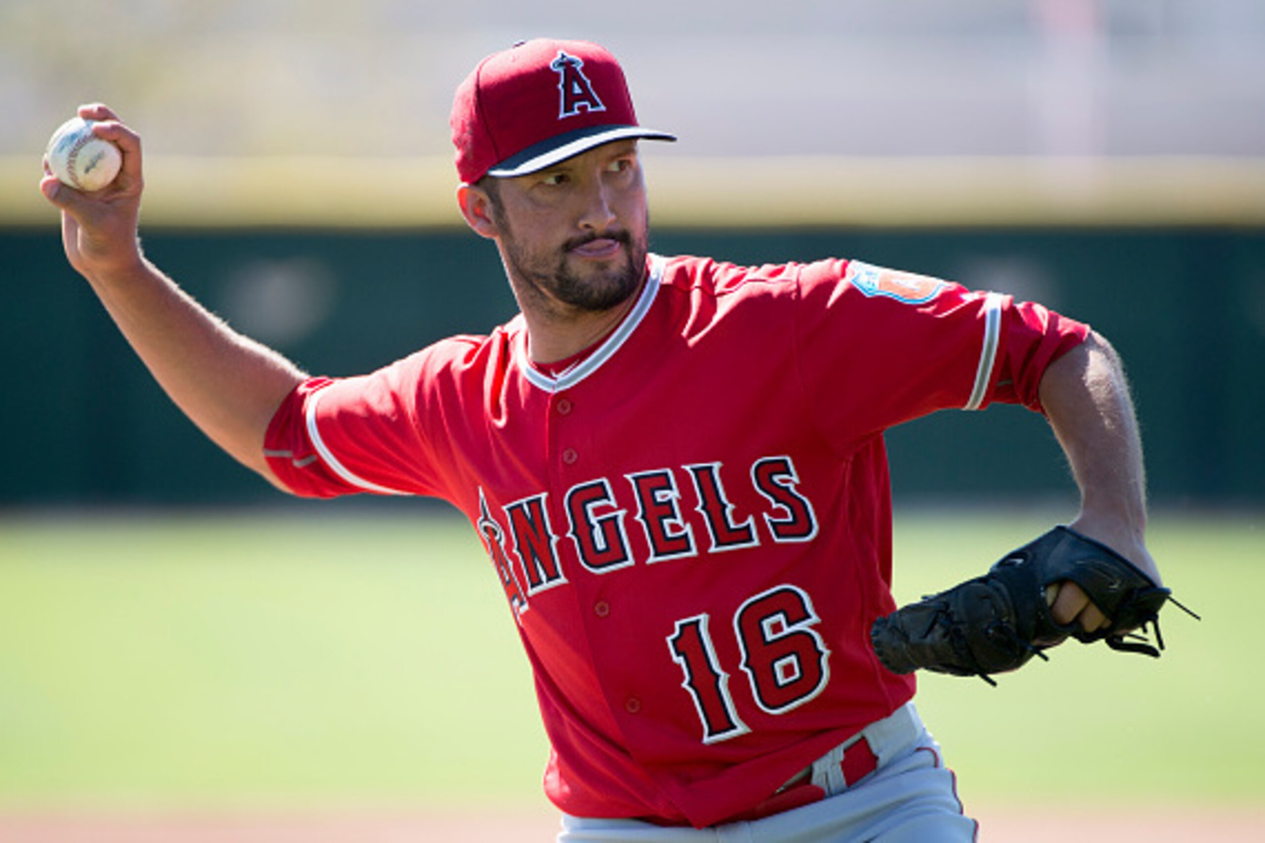 TEMPE, AZ - February 28: Huston Street #16 of the Los Angeles Angels of Anaheim throws a ball during spring training on February 28, 2016 at Tempe Diablo Stadium in Tempe, Arizona. (Photo by Matt Brown/Angels Baseball LP/Getty Images)