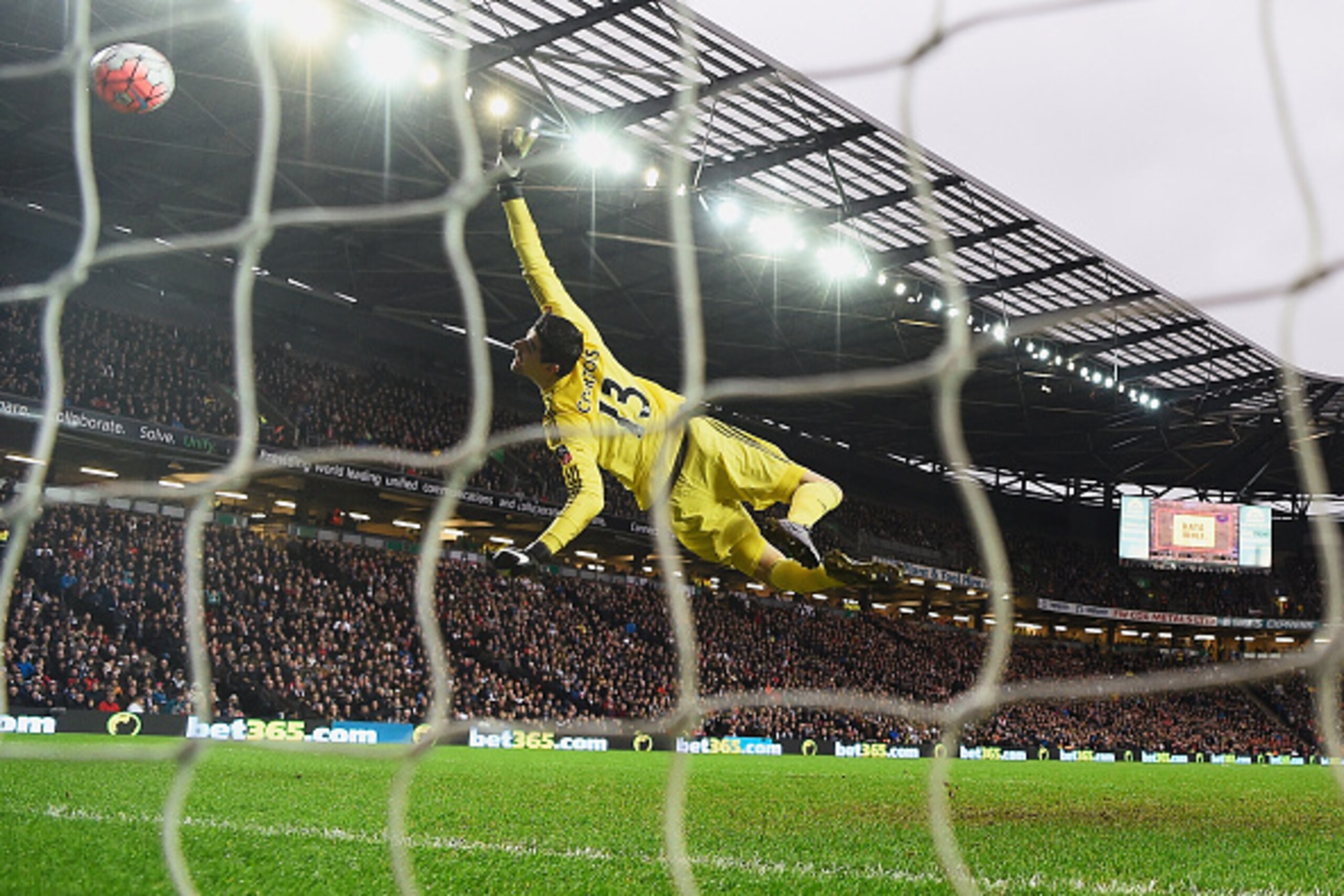 MILTON KEYNES, ENGLAND - JANUARY 31: Thibaut Courtois of Chelsea fails to stop the shot by Darren Potter of MK Dons during the Emirates FA Cup Fourth Round match between Milton Keynes Dons and Chelsea at Stadium mk on January 31, 2016 in Milton Keynes, En