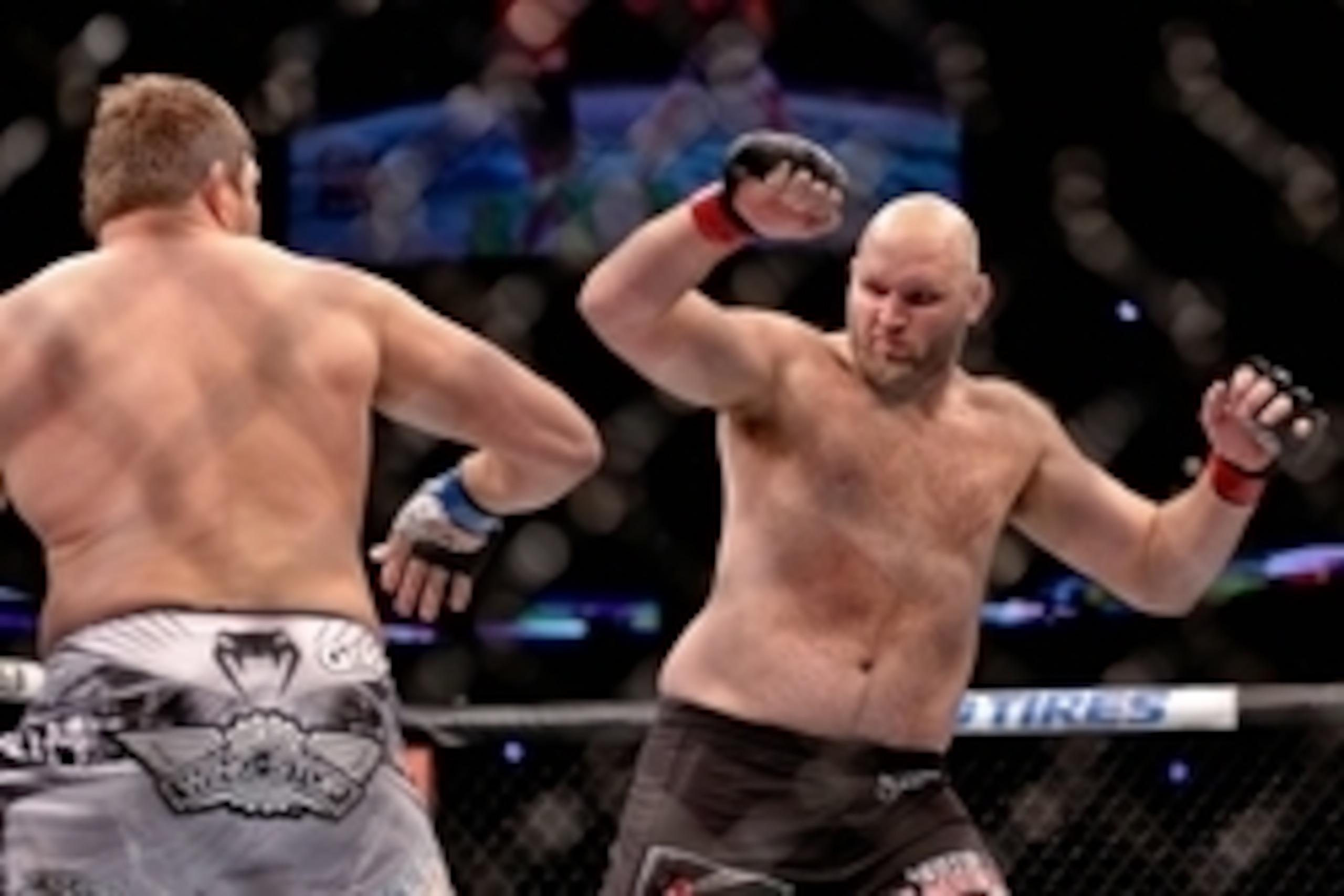 Jun 6, 2015; New Orleans, LA, USA; Ben Rothwell (red gloves) fights Matt Mitrione (blue gloves) during UFC Fight Night at the Smoothie King Center. Mandatory Credit: Derick E. Hingle-USA TODAY Sports