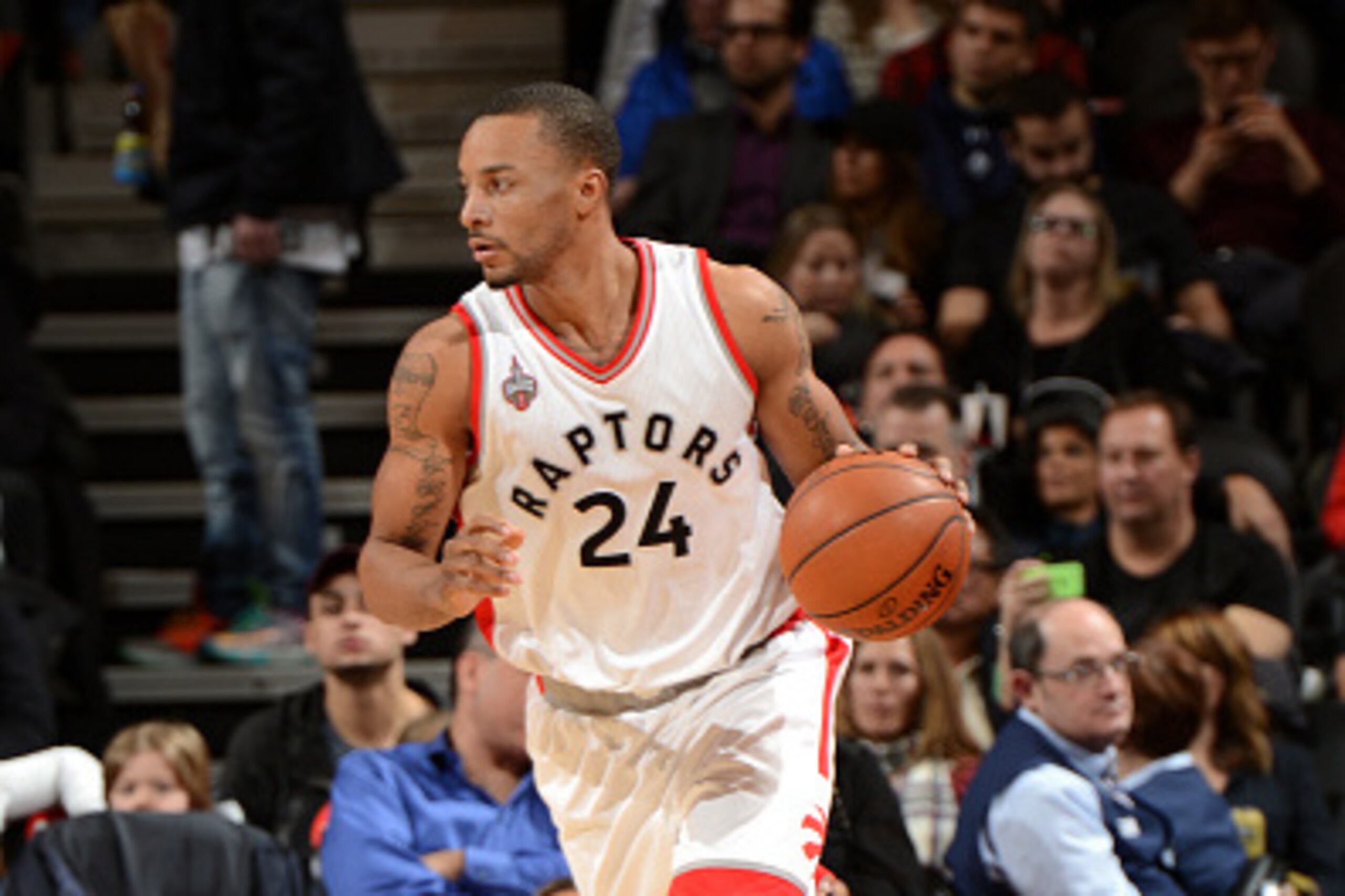 TORONTO, CANADA - MARCH 28: Norman Powell #24 of the Toronto Raptors handles the ball during the game against the Oklahoma City Thunder on March 28, 2016 at the Air Canada Centre in Toronto, Ontario, Canada.  NOTE TO USER: User expressly acknowledges and 