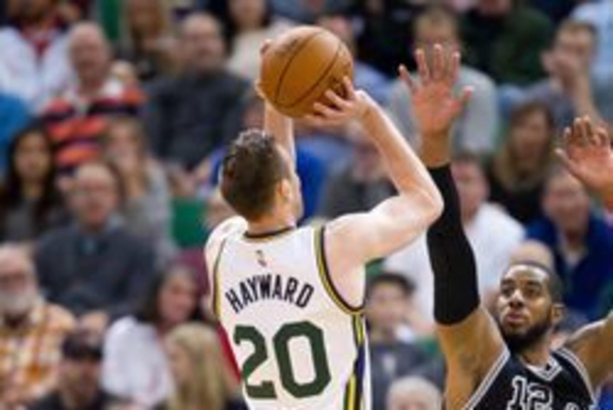 Apr 5, 2016; Salt Lake City, UT, USA; Utah Jazz forward Gordon Hayward (20) shoots the ball against San Antonio Spurs forward LaMarcus Aldridge (12) during the second half at Vivint Smart Home Arena. San Antonio won 88-86. Mandatory Credit: Russ Isabella-