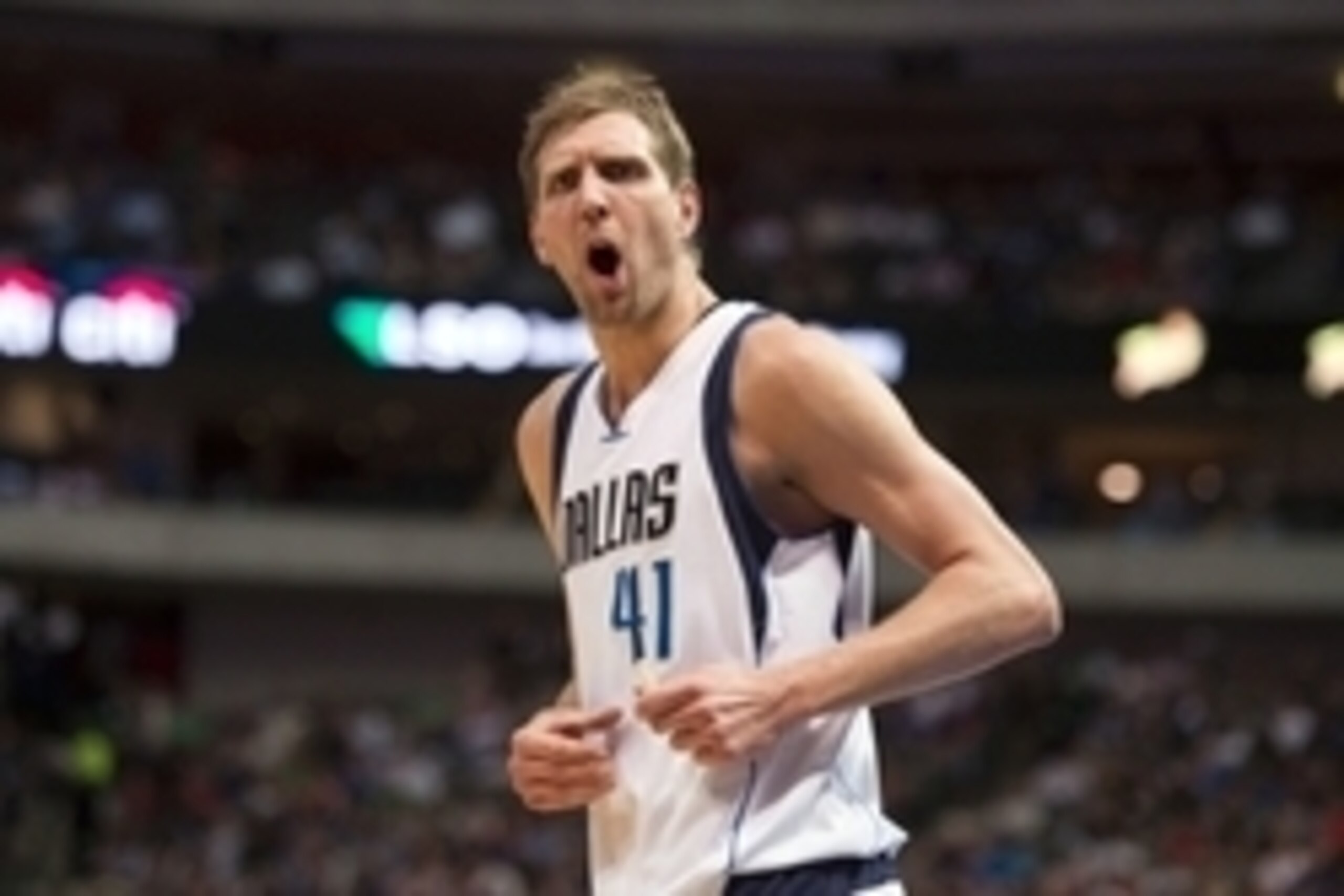 Apr 6, 2016; Dallas, TX, USA; Dallas Mavericks forward Dirk Nowitzki (41) argues a call with the referees during the second half against the Houston Rockets at the American Airlines Center. The Mavericks defeat the Rockets 88-86. Mandatory Credit: Jerome 