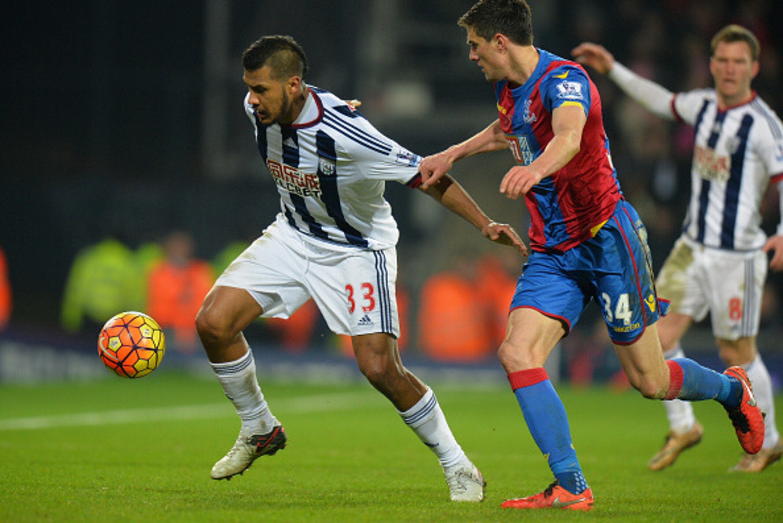 WEST BROMWICH, ENGLAND - FEBRUARY 27: Salomon Rondon of West Bromwich Albion is tackled by Martin Kelly of Crystal Palace during the Barclays Premier League match between West Bromwich Albion and Crystal Palace at The Hawthorns on February 27, 2016 in Wes
