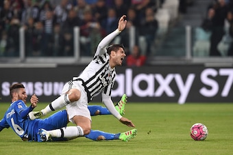 TURIN, ITALY - APRIL 02:  Alvaro Morata (R) of Juventus FC is tackled by Luca Bittante of Empoli FC during the Serie A match between Juventus FC and Empoli FC at Juventus Arena on April 2, 2016 in Turin, Italy.  (Photo by Valerio Pennicino/Getty Images)