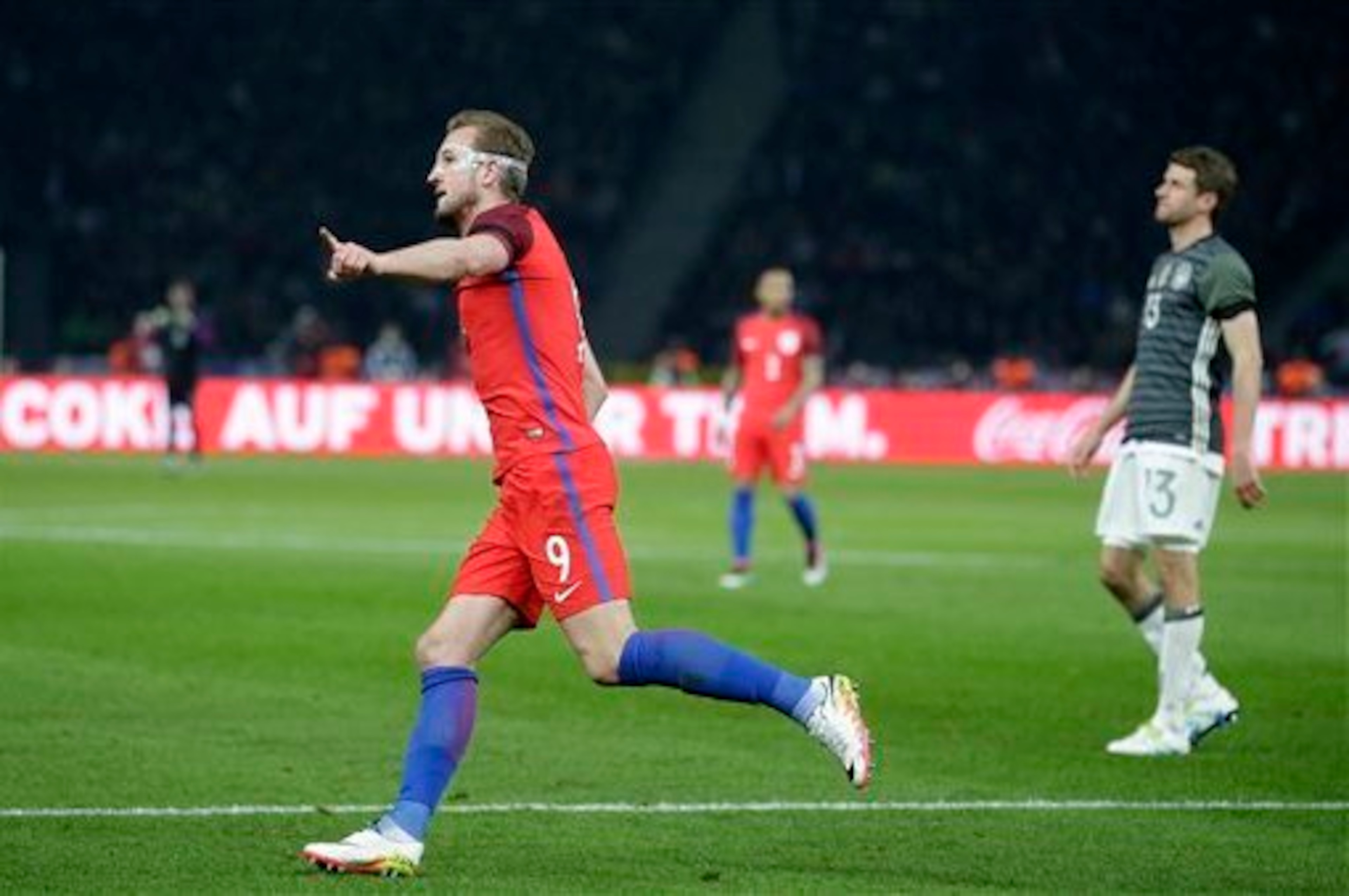 Kane celebrates his match-turning goal against Germany.