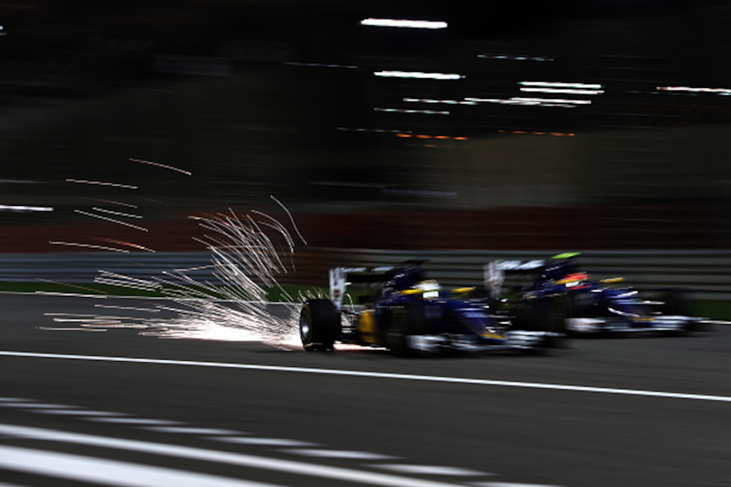 SAKHIR, BAHRAIN - APRIL 03: Marcus Ericsson of Sweden drives the (9) Sauber F1 Team Sauber C35 Ferrari 059/5 turbo and Felipe Nasr of Brazil drives the (12) Sauber F1 Team Sauber C35 Ferrari 059/5 turbo on track during the Bahrain Formula One Grand Prix a SAKHIR, BAHRAIN - APRIL 03: Marcus Ericsson of Sweden drives the (9) Sauber F1 Team Sauber C35 Ferrari 059/5 turbo and Felipe Nasr of Brazil drives the (12) Sauber F1 Team Sauber C35 Ferrari 059/5 turbo on track during the Bahrain Formula One Grand Prix a