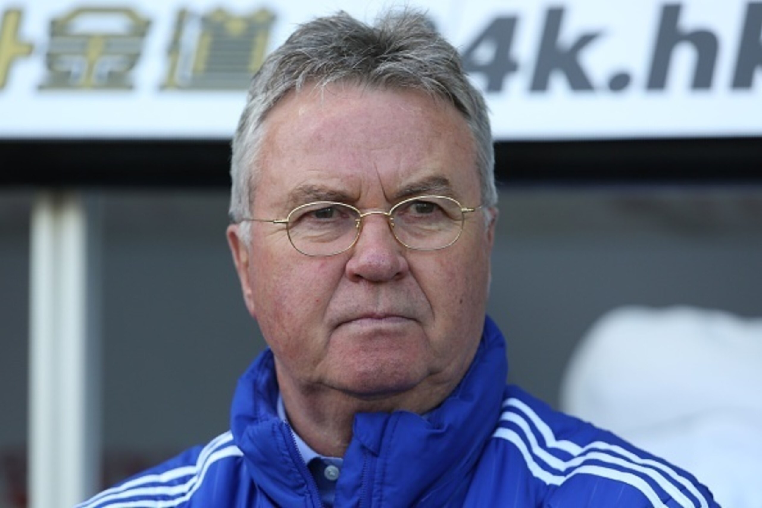 Chelsea's Dutch interim manager Guus Hiddink watches his players warm up ahead of the English Premier League football match between Swansea City and Chelsea at The Liberty Stadium in Swansea, south Wales on April 9, 2016. / AFP / GEOFF CADDICK        (Pho