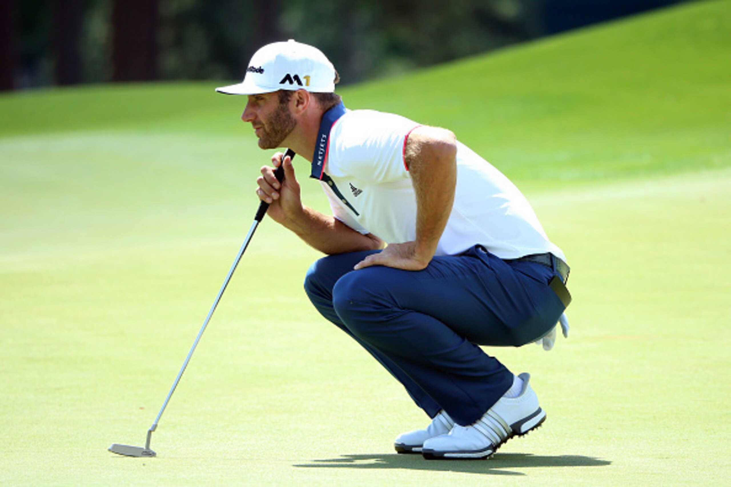 AUGUSTA, GEORGIA - APRIL 07: Dustin Johnson of the United States lines up a putt on the eighth green during the first round of the 2016 Masters Tournament at Augusta National Golf Club on April 7, 2016 in Augusta, Georgia. (Photo by Andrew Redington/Get AUGUSTA, GEORGIA - APRIL 07: Dustin Johnson of the United States lines up a putt on the eighth green during the first round of the 2016 Masters Tournament at Augusta National Golf Club on April 7, 2016 in Augusta, Georgia. (Photo by Andrew Redington/Get