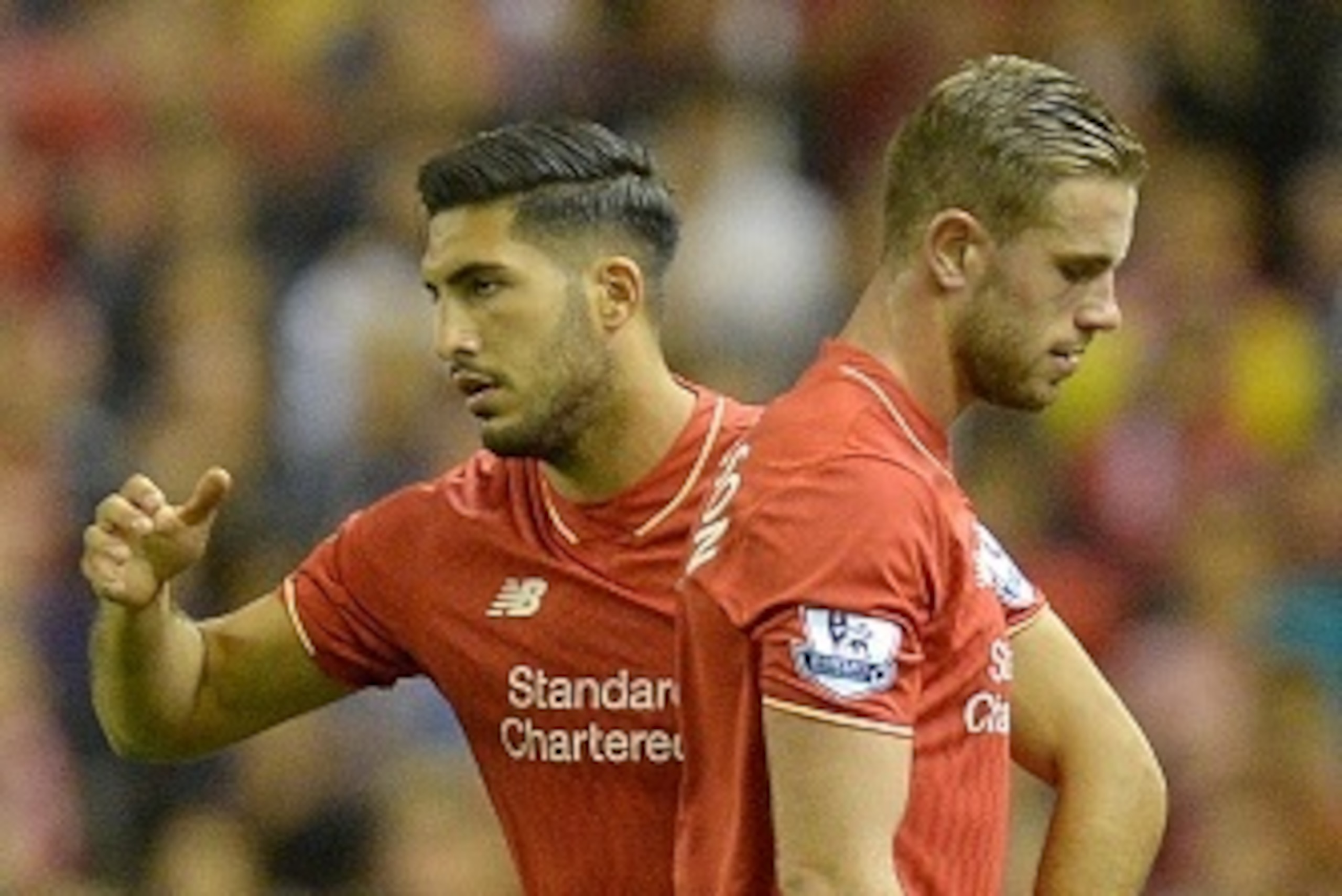 Liverpool's English midfielder Jordan Henderson (R) is substituted by Liverpool's German midfielder Emre Can during the English Premier League football match between Liverpool and Bournemouth at the Anfield stadium in Liverpool, north-west England on Augu