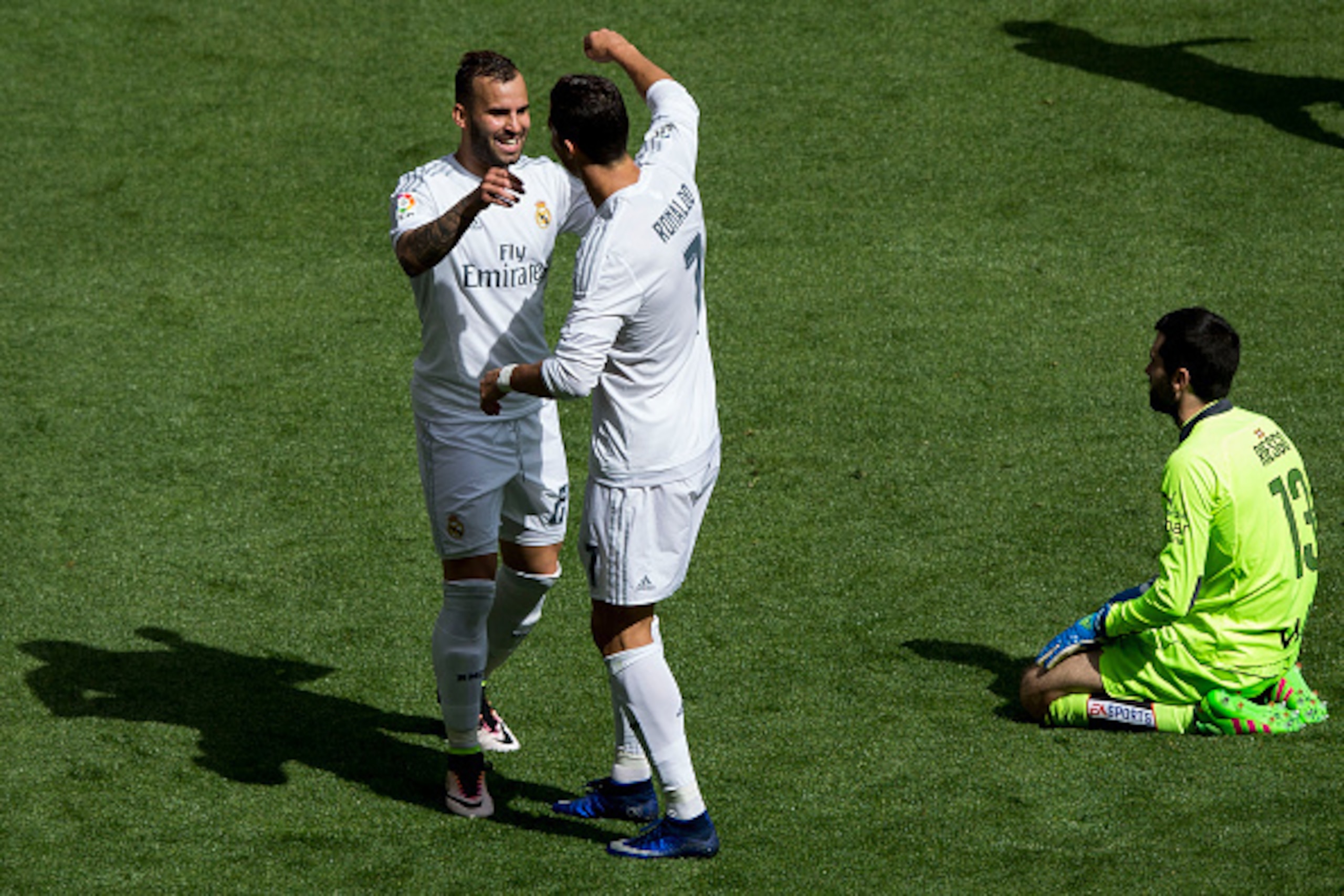 MADRID, SPAIN - APRIL 09: Jese Rodriguez (L) of Real Madrid CF celebrates scoring their fourth goal with teammate Cristiano Ronaldo (2ndL) during the La Liga match between Real Madrid CF and SD Eibar at Estadio Santiago Bernabeu on April 9, 2016 in Madrid