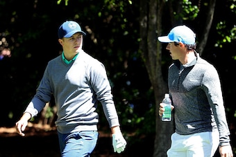 AUGUSTA, GEORGIA - APRIL 09:  Jordan Spieth of the United States and Rory McIlroy of Northern Ireland walk on the second hole during the third round of the 2016 Masters Tournament at Augusta National Golf Club on April 9, 2016 in Augusta, Georgia.  (Photo