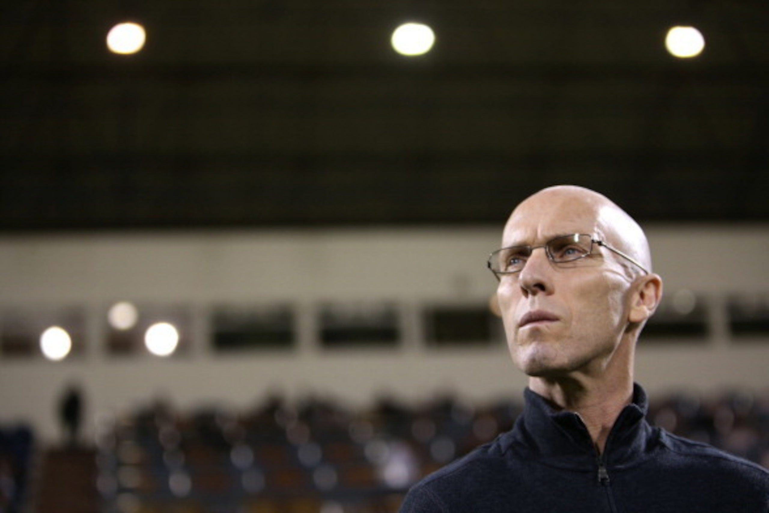 Egypt's US coach Bob Bradley attends his team's friendly football match against Qatar in the Qatari capital Doha on December 28, 2012. Egypt won 2-0. AFP PHOTO / AL-WATAN DOHA / KARIM JAAFAR == QATAR OUT ==        (Photo credit should read KARIM JAAFAR/AF