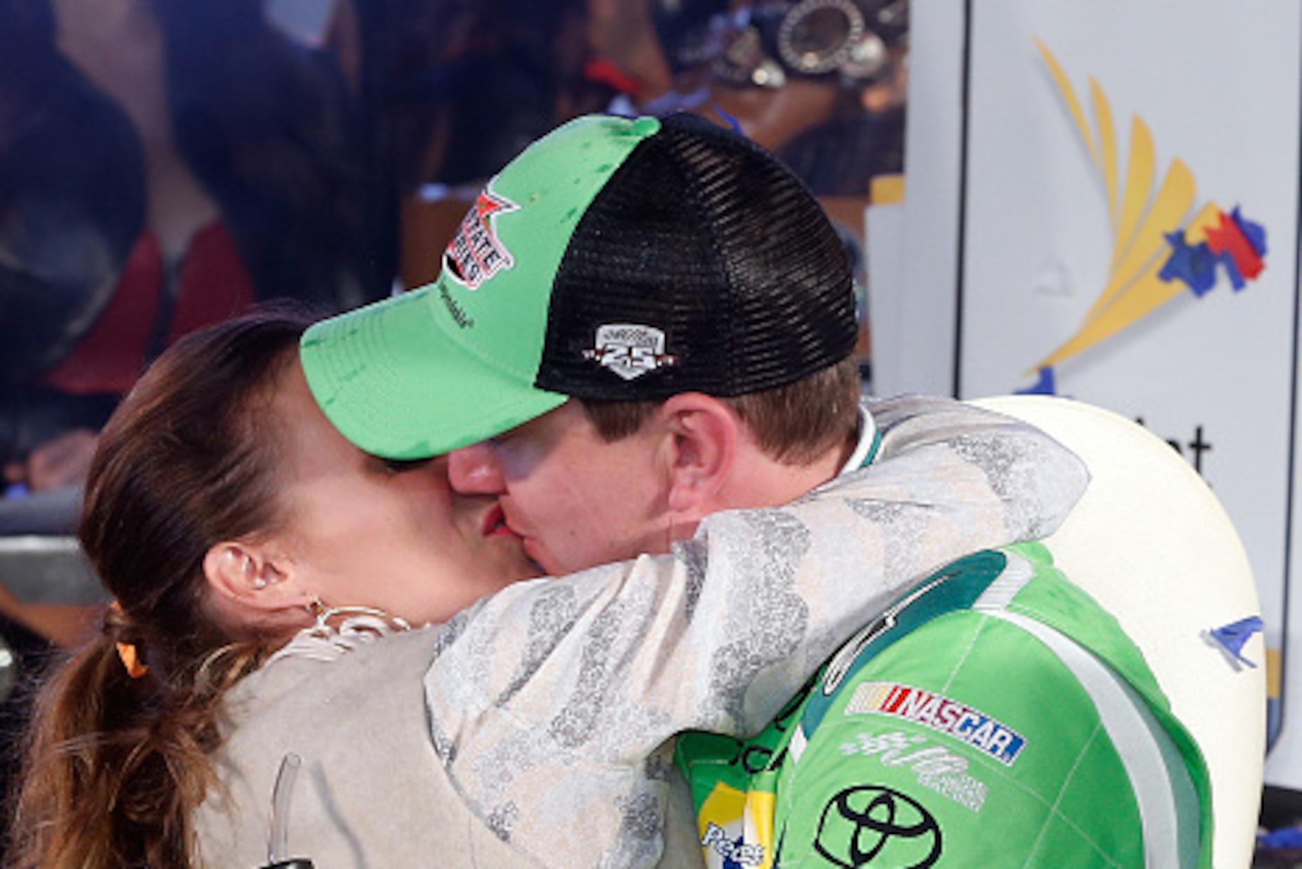 FORT WORTH, TEXAS - APRIL 09:  Kyle Busch, driver of the #18 Interstate Batteries Toyota, celebrates with his wife Samantha after winning the NASCAR Sprint Cup Series Duck Commander 500 at Texas Motor Speedway on April 9, 2016 in Fort Worth, Texas.  (Phot