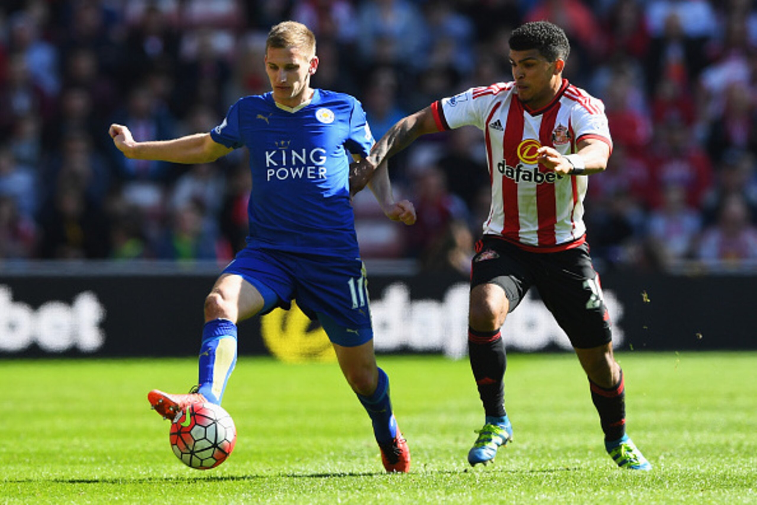 SUNDERLAND, UNITED KINGDOM - APRIL 10:  Marc Albrighton of Leicester City holds off DeAndre Yedlin of Sunderland during the Barclays Premier League match between Sunderland and Leicester City at the Stadium of Light on April 10, 2016 in Sunderland, Englan