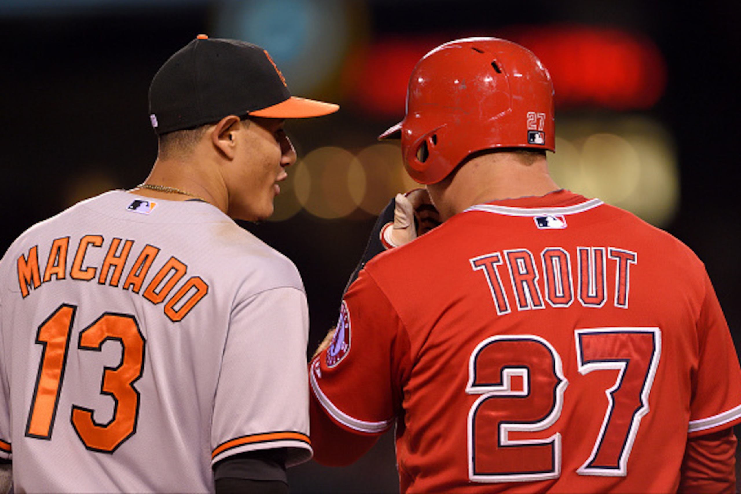ANAHEIM, CA - AUGUST 8: Manny Machado #13 of the Baltimore Orioles and Mike Trout #27 of the Los Angeles Angels of Anaheim talk during the game at Angel Stadium of Anaheim on August 8, 2015 in Anaheim, California. (Photo by Matt Brown/Angels Baseball LP/G