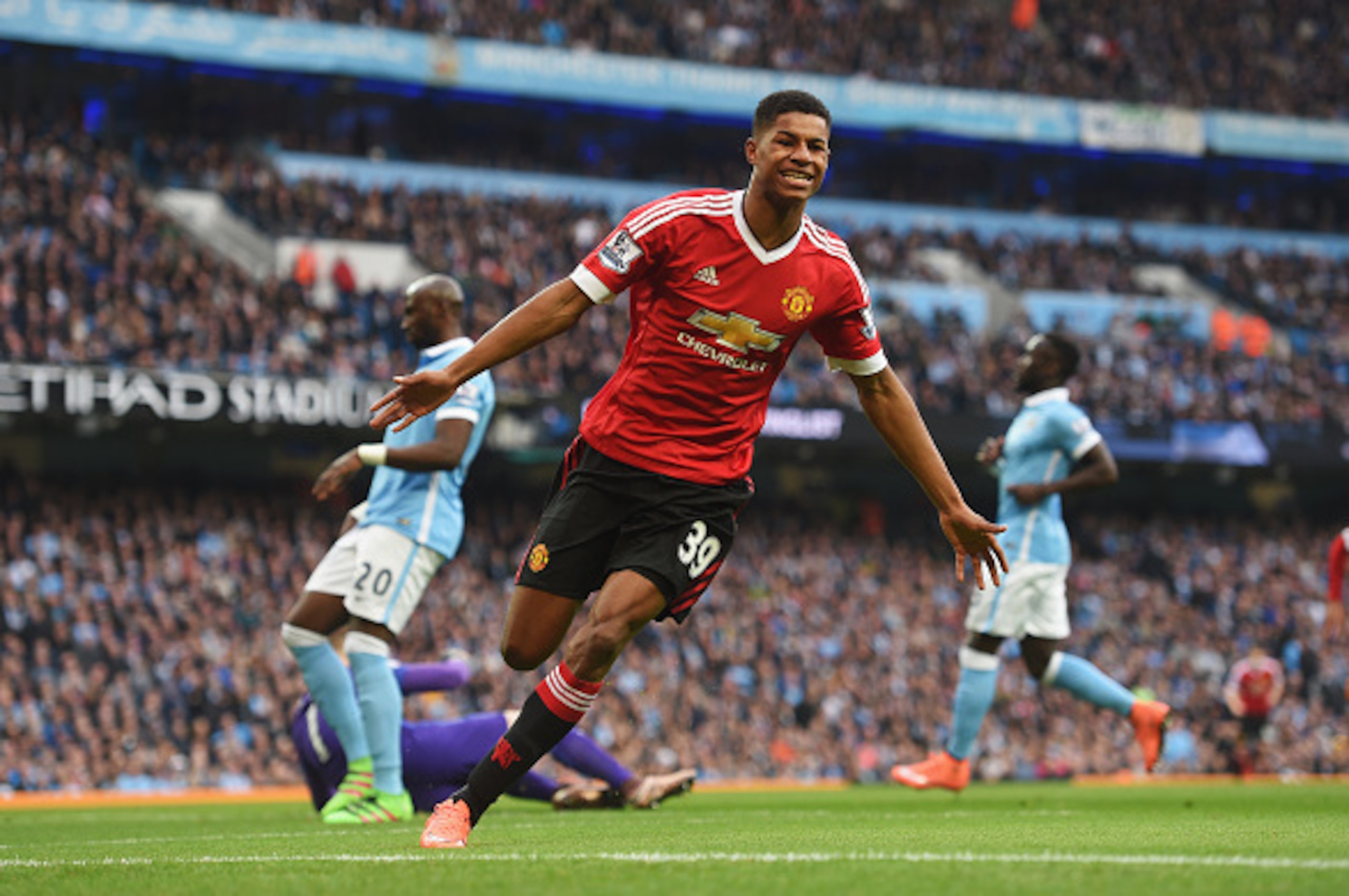 MANCHESTER, ENGLAND - MARCH 20:  Marcus Rashford of Manchester United celebrates as he scores their first goal during the Barclays Premier League match between Manchester City and Manchester United at Etihad Stadium on March 20, 2016 in Manchester, United