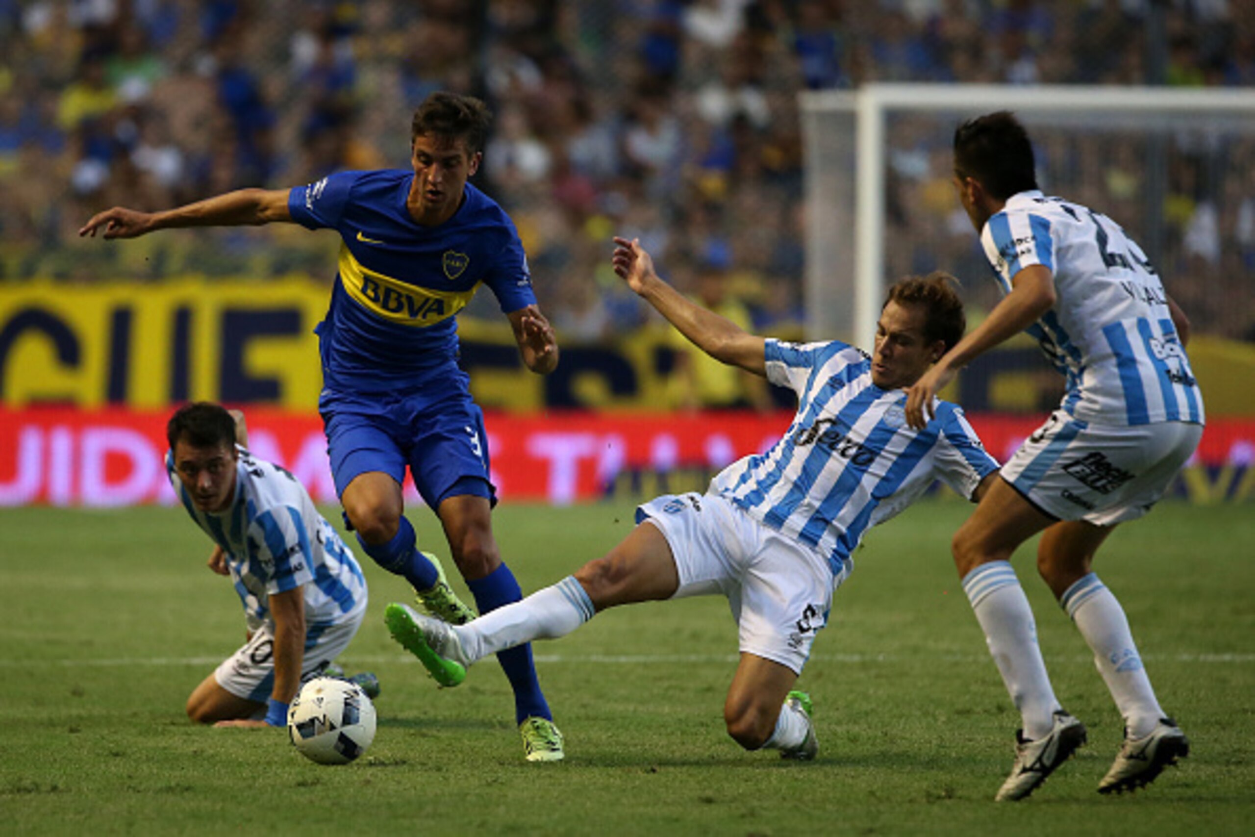 BUENOS AIRES, ARGENTINA - FEBRUARY 14: Rodrigo Bentancur of Boca Juniors in action with Nery Leyes of Atletico Tucuman during the Argentine Primera Division match between Boca Juniors and Atletico Tucuman at the Alberto J Armando Stadium on February 14, 2